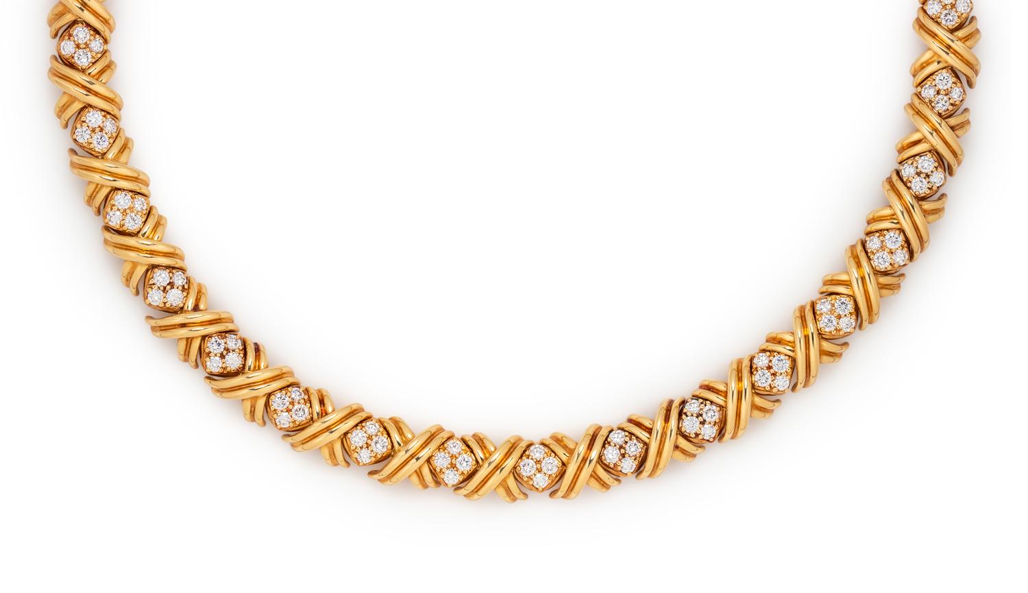 TIFFANY & CO., YELLOW GOLD AND DIAMOND 'X' NECKLACE