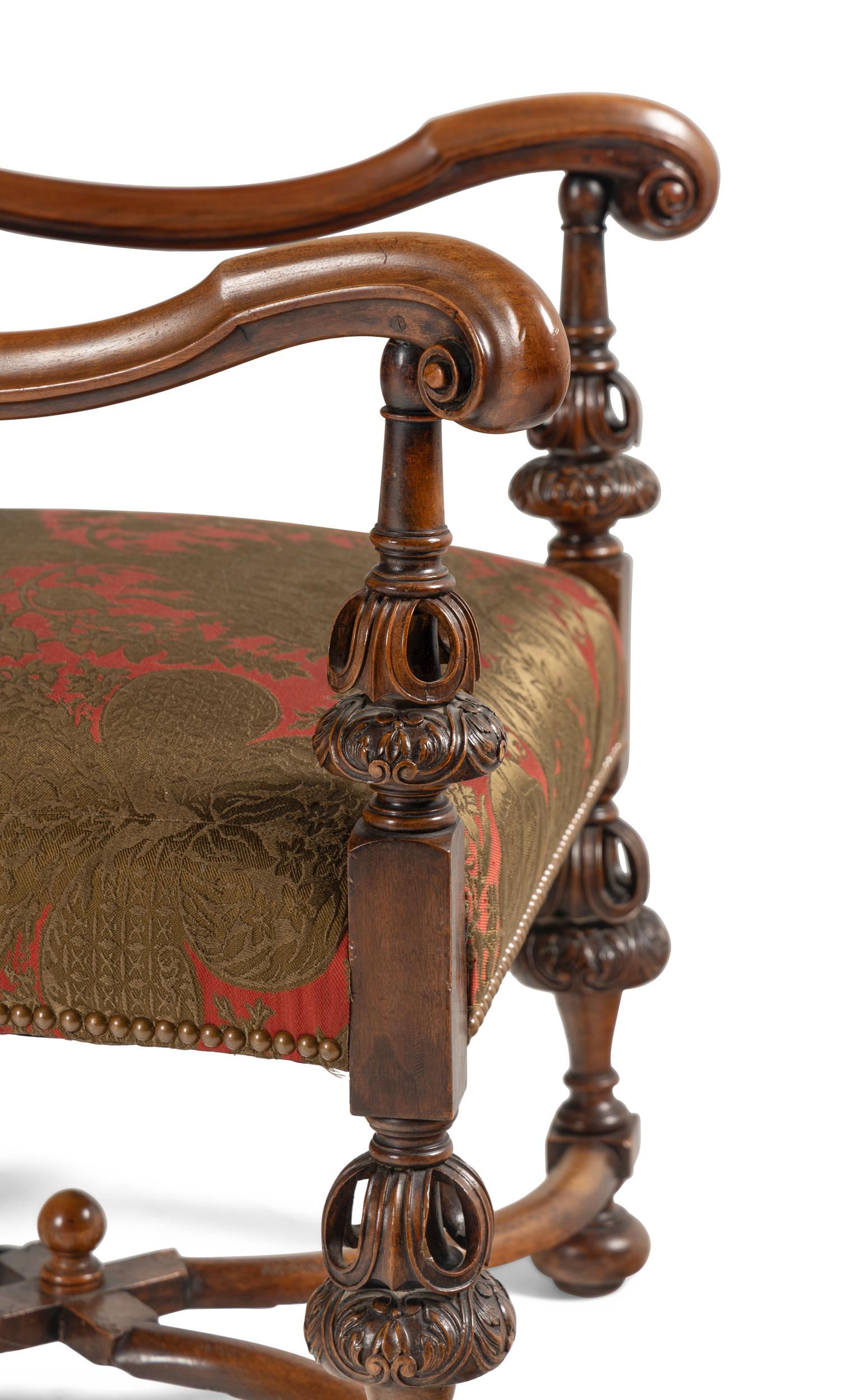 A Pair of William and Mary Style Walnut Armchairs