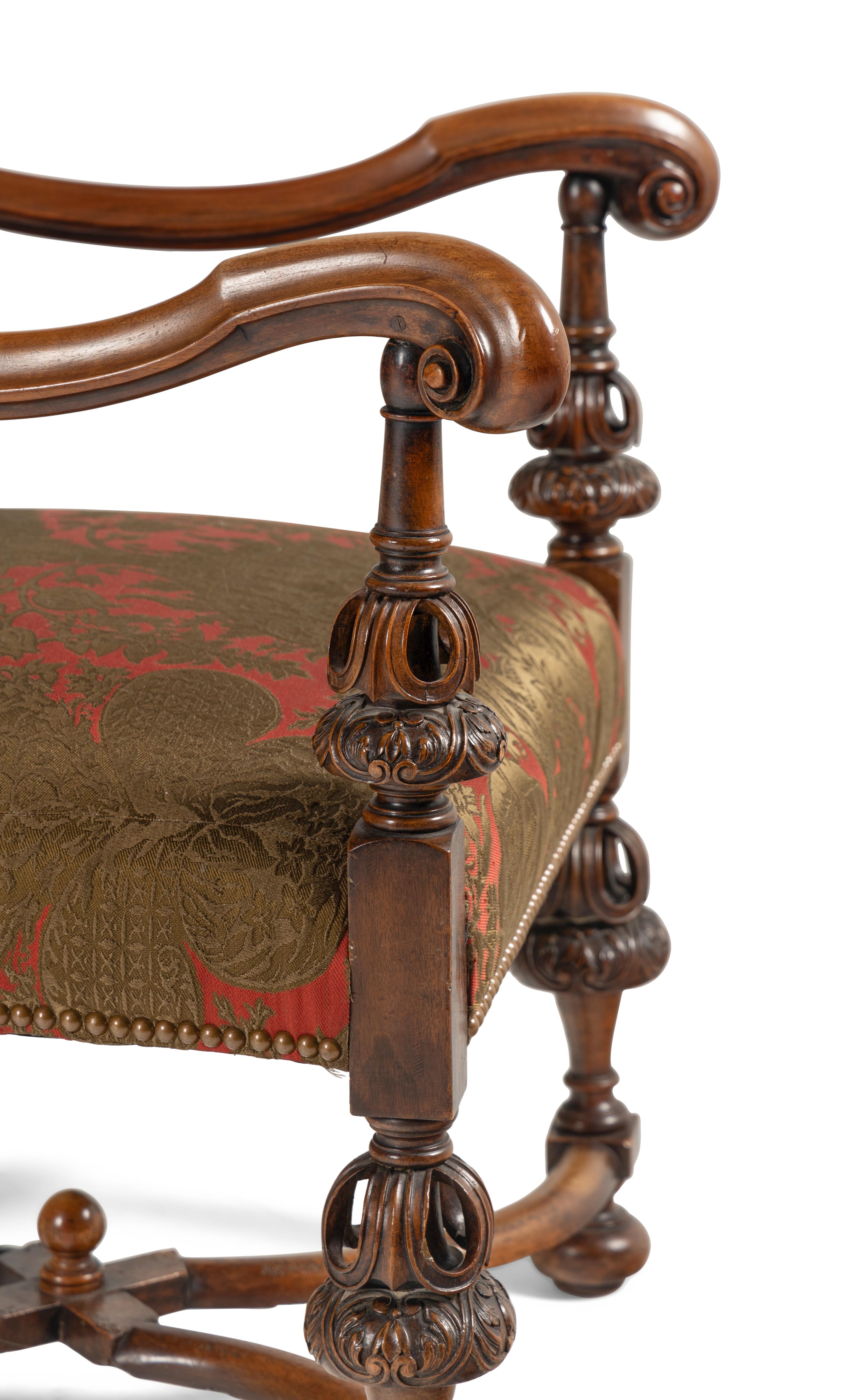 A Pair of William and Mary Style Walnut Armchairs