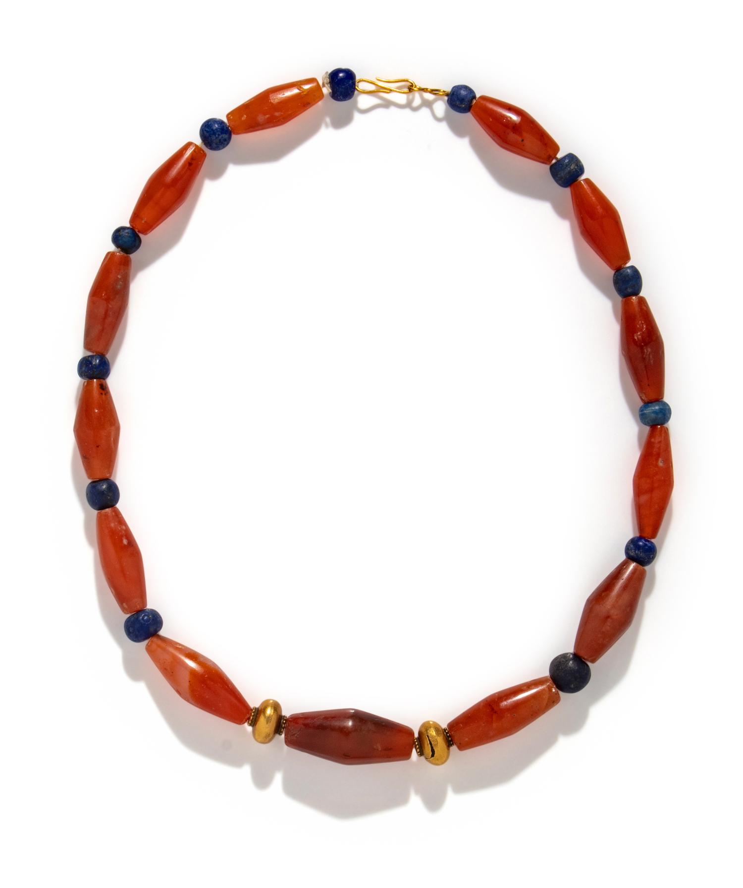 A Western Asiatic Carnelian, Lapis Lazuli, and Gold Bead Necklace