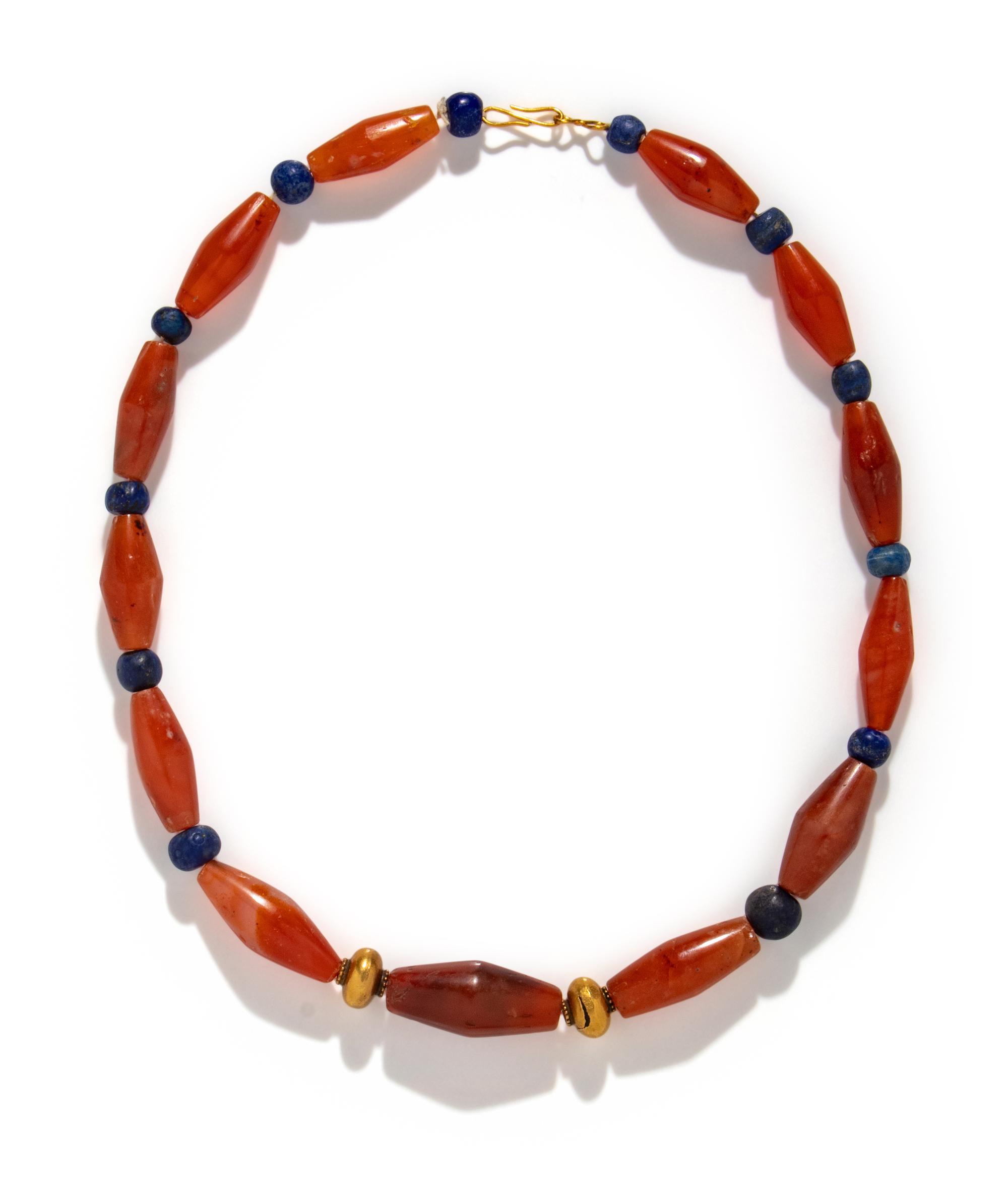 A Western Asiatic Carnelian, Lapis Lazuli, and Gold Bead Necklace