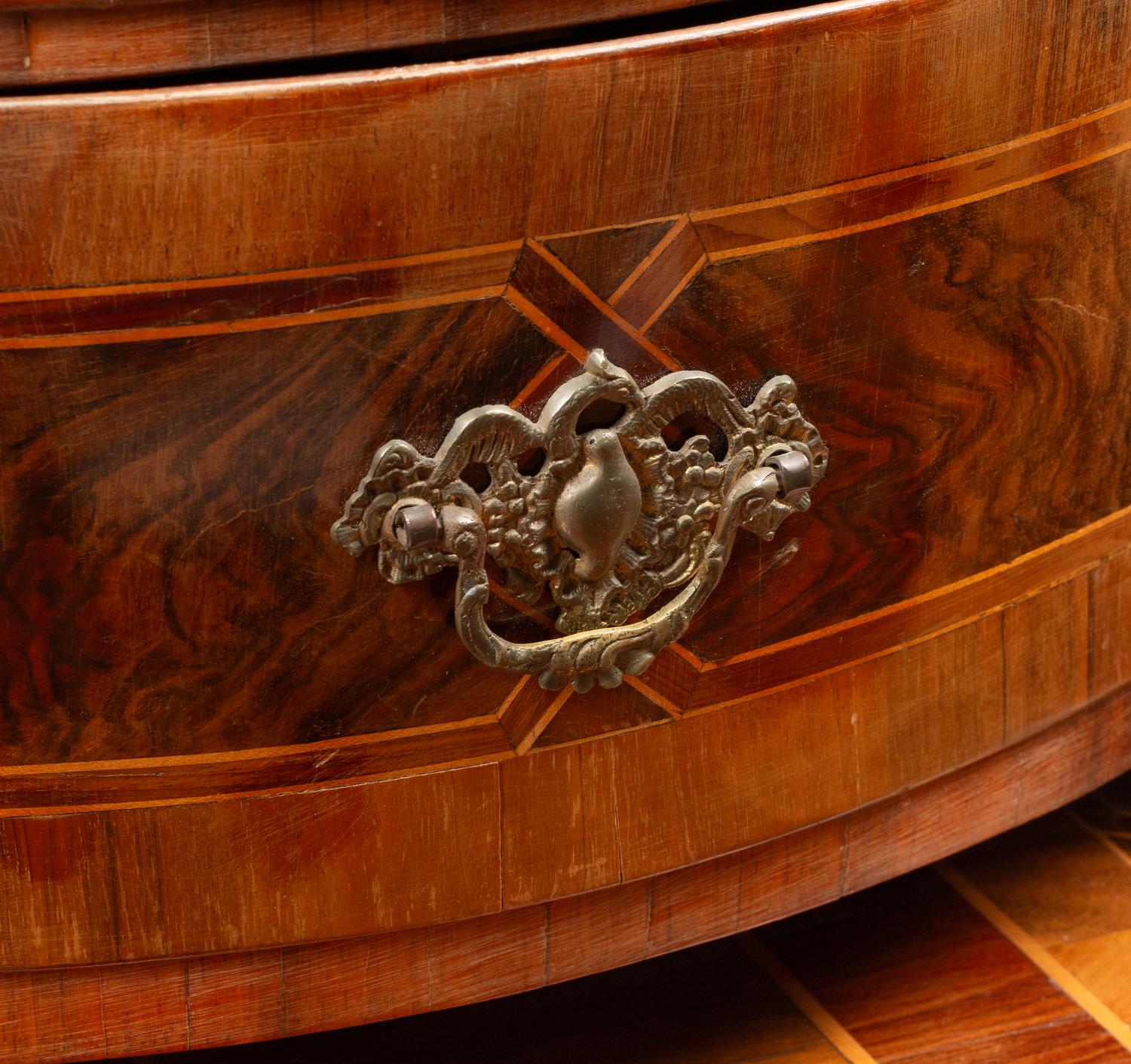 A German or Austrian Walnut and Marquetry Tabernacle Cabinet and Chest of Drawers