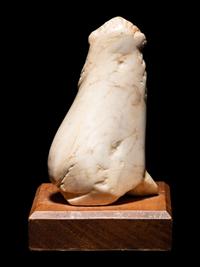 An Alabaster Seated Lion