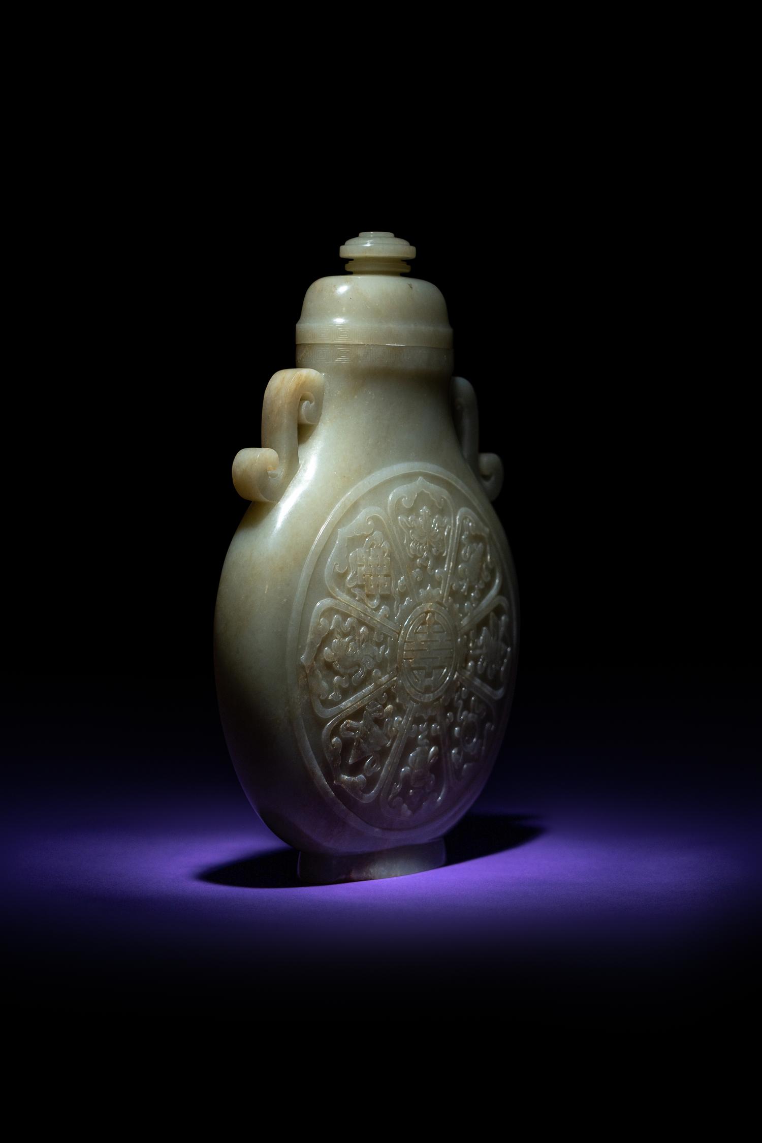 A Rare and Finely Carved Chinese White Jade Covered Vase