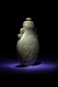 A Rare and Finely Carved Chinese White Jade Covered Vase
