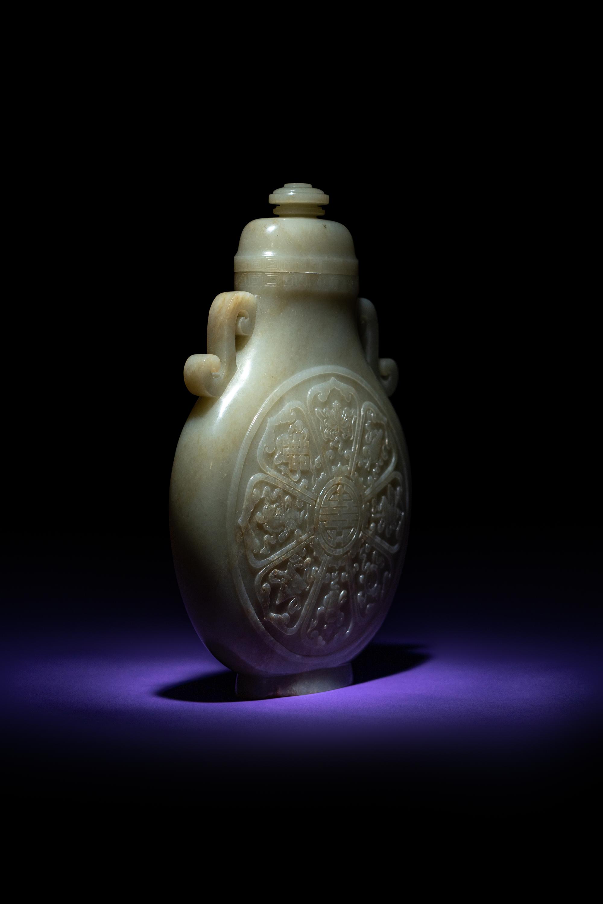 A Rare and Finely Carved Chinese White Jade Covered Vase