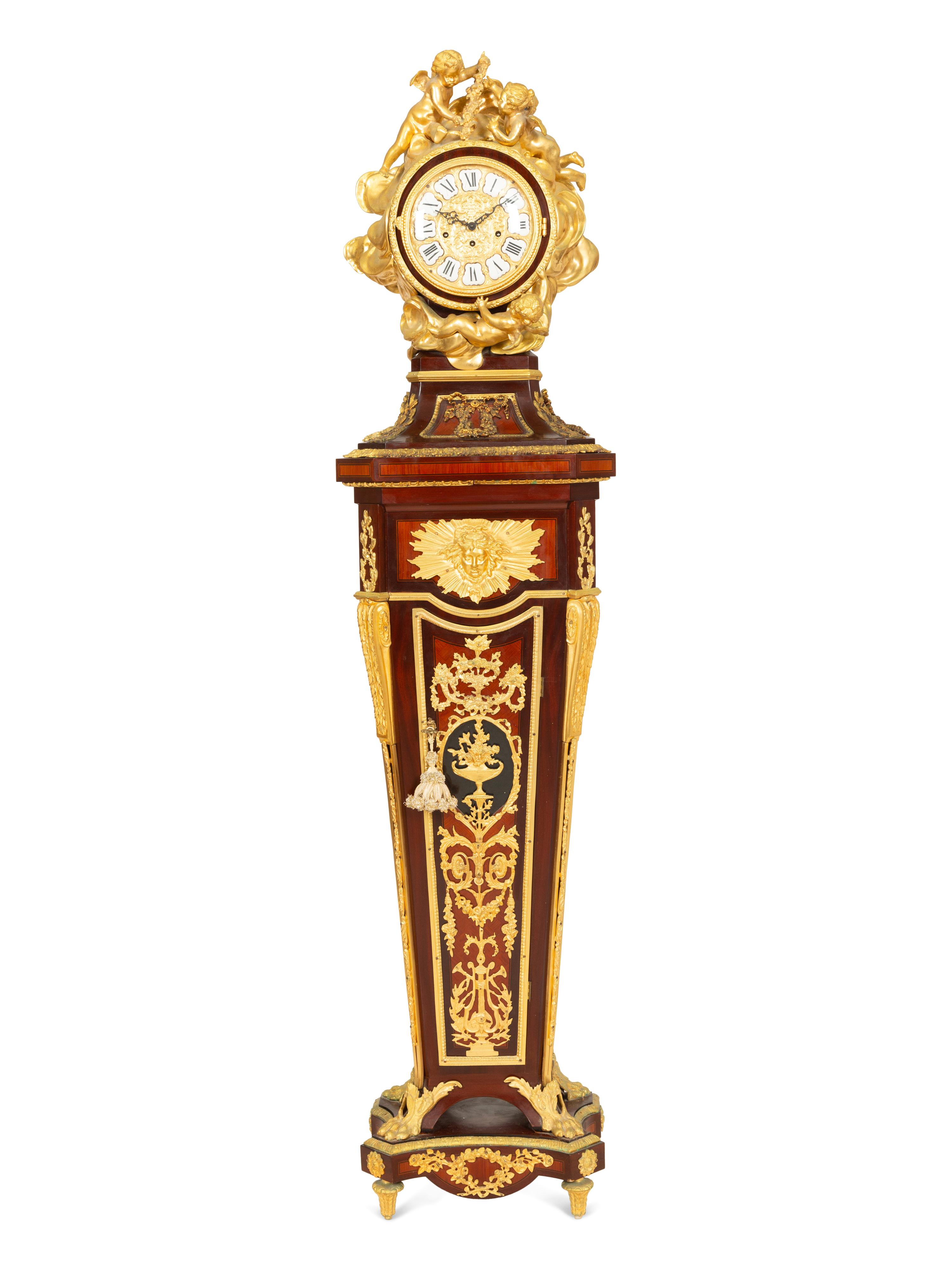 A Louis XVI Style Gilt Bronze Mounted Parquetry Régulateur
