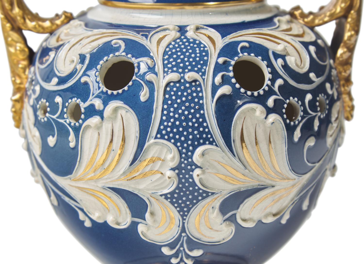 A Wedgwood Parcel Gilt Queensware Twin-Handled Vase and Cover