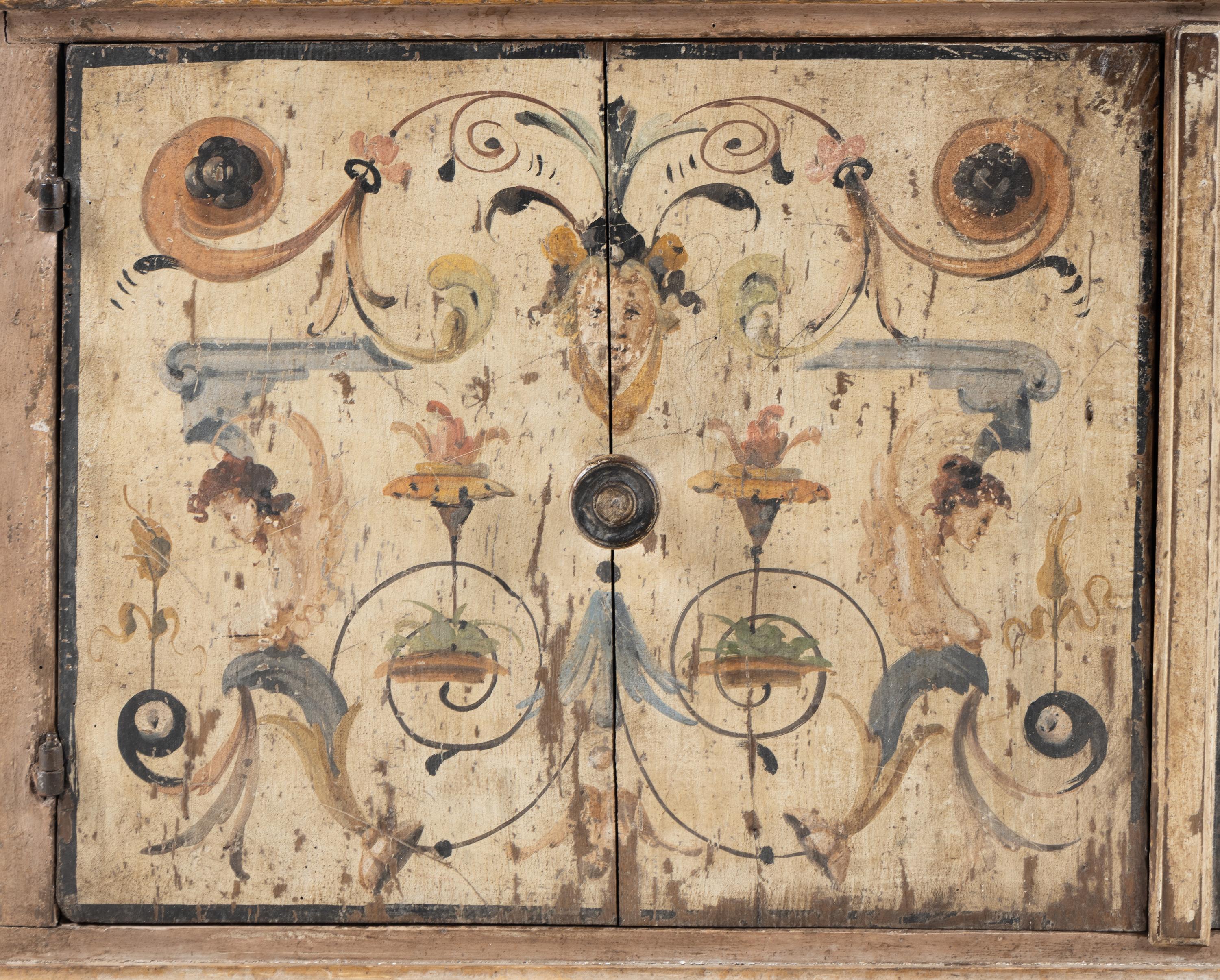 An Italian Painted Oak Console Cabinet