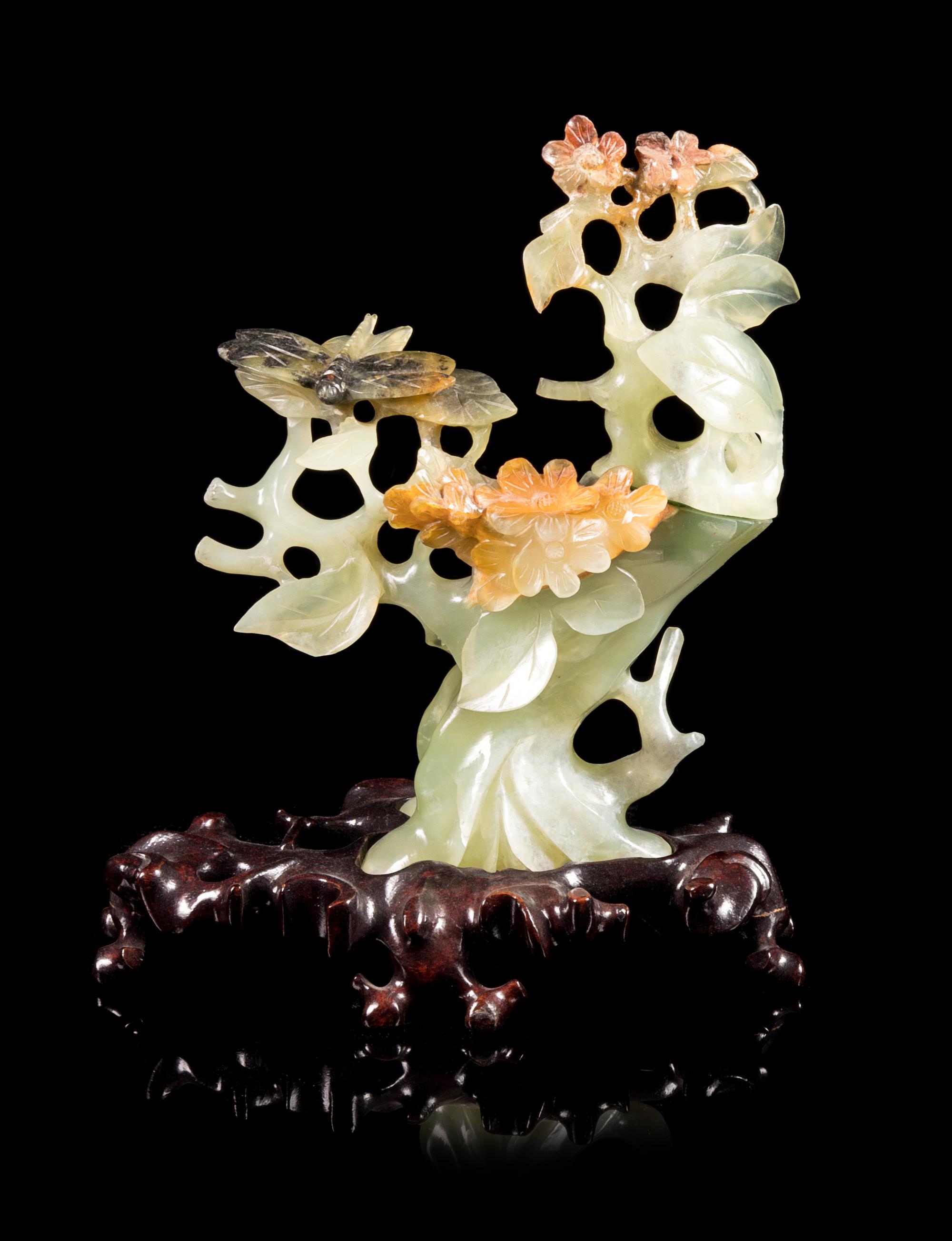 A Serpentine Carving of a Flowering Tree Height 6 1/4 inches. — 20TH CENTURY