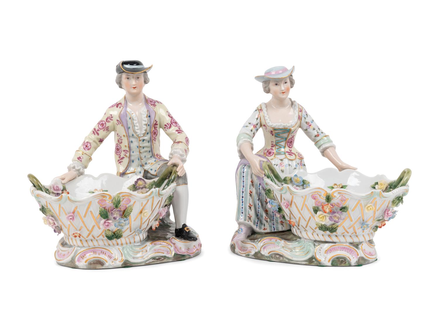 A Pair of Dresden Porcelain Figural Sweetmeat Dishes