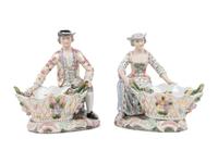 A Pair of Dresden Porcelain Figural Sweetmeat Dishes