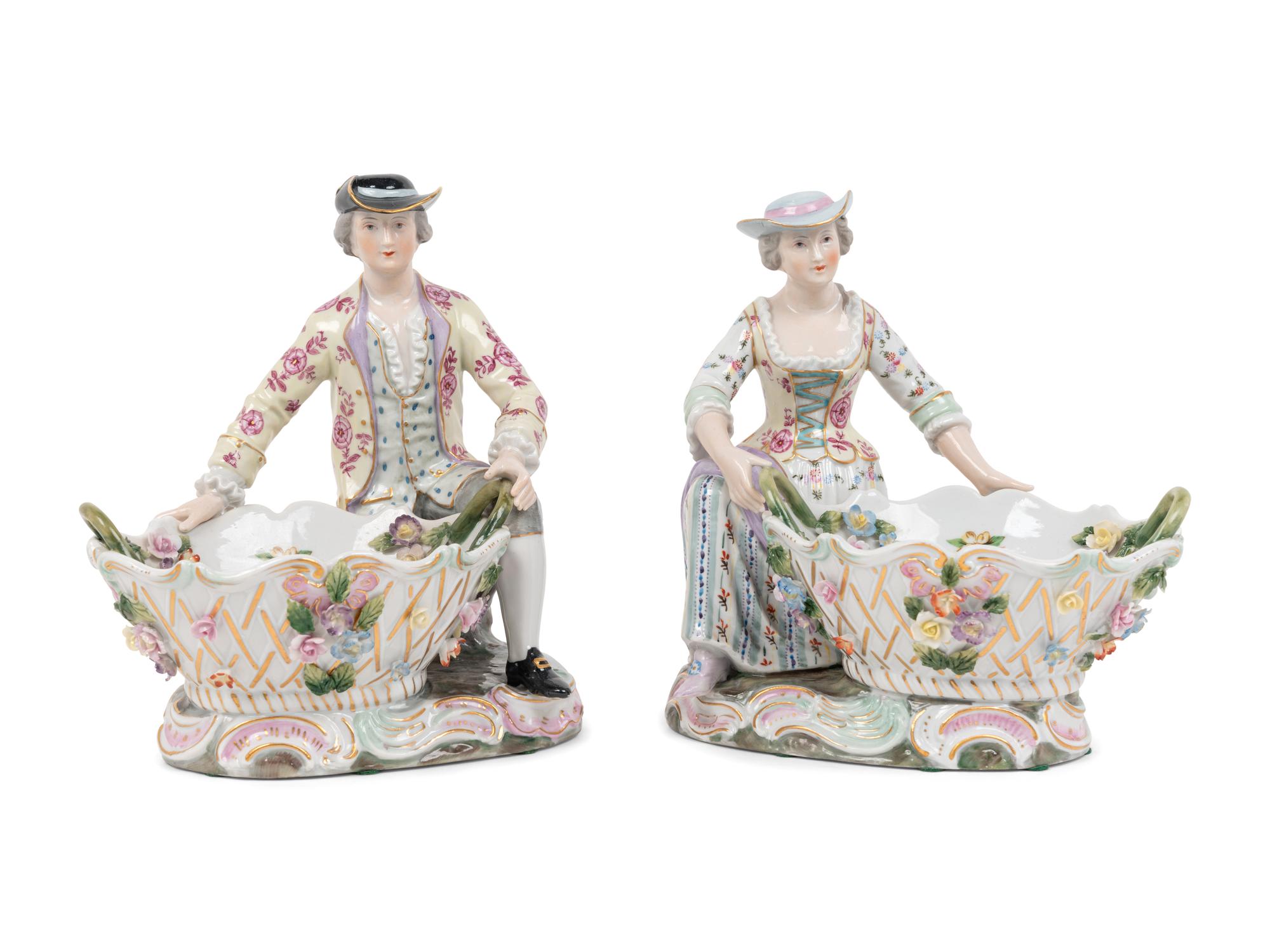 A Pair of Dresden Porcelain Figural Sweetmeat Dishes