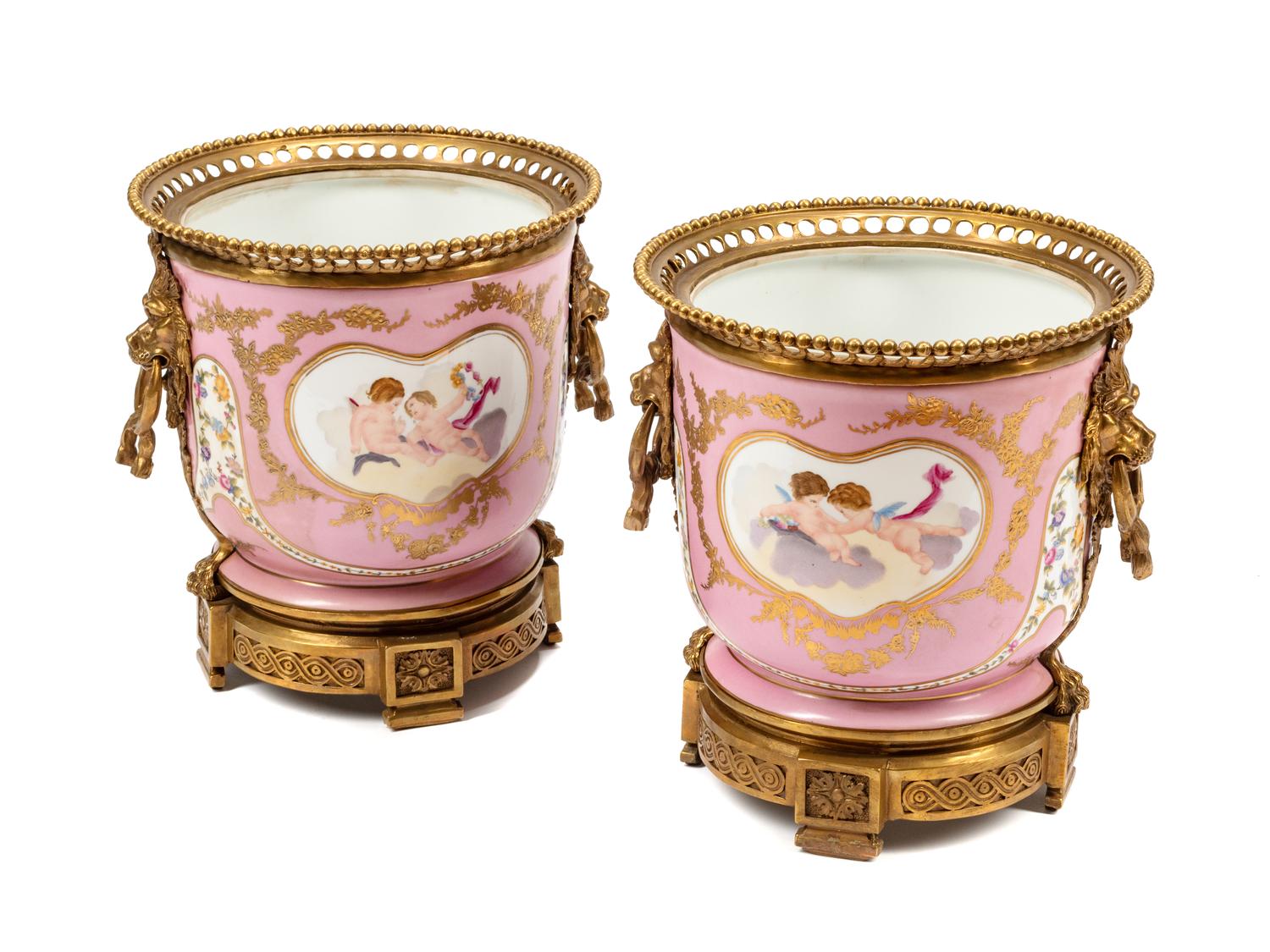 A Pair of Sèvres Style Gilt Bronze Mounted Porcelain Cache Pots