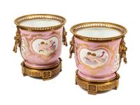 A Pair of Sèvres Style Gilt Bronze Mounted Porcelain Cache Pots