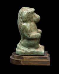 An Egyptian Faience Baboon