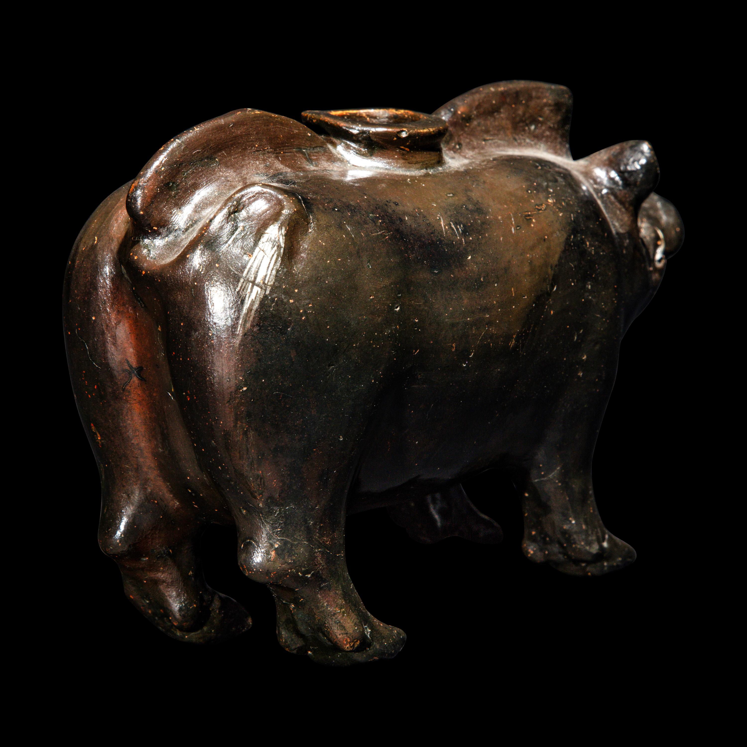 A South Italian Black-Glazed Askos in the form of a Boar