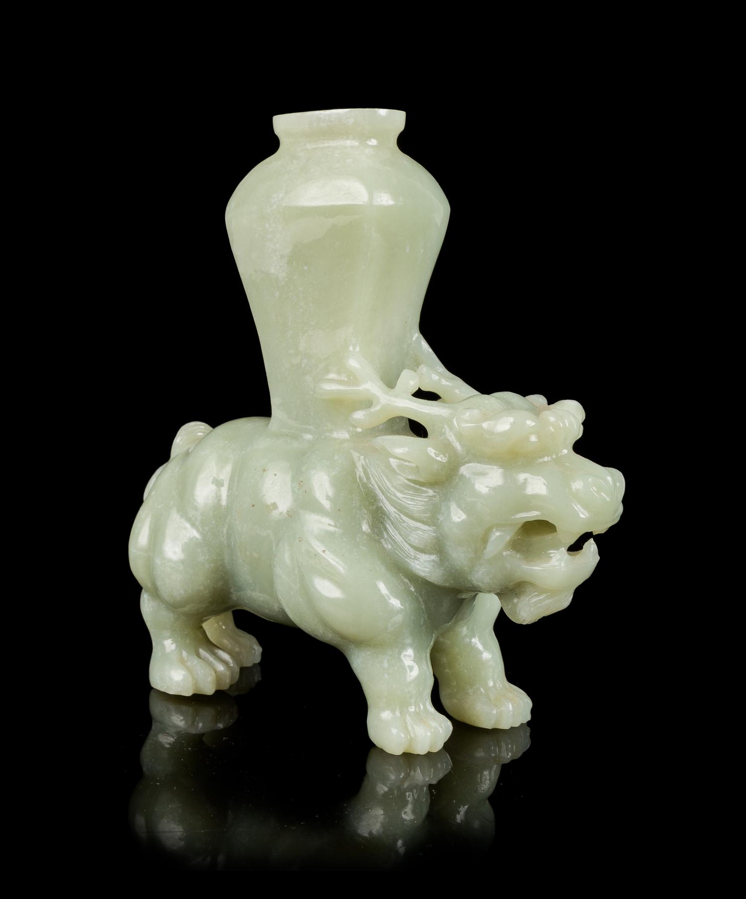 A Celadon Jade Animal Form Vessel