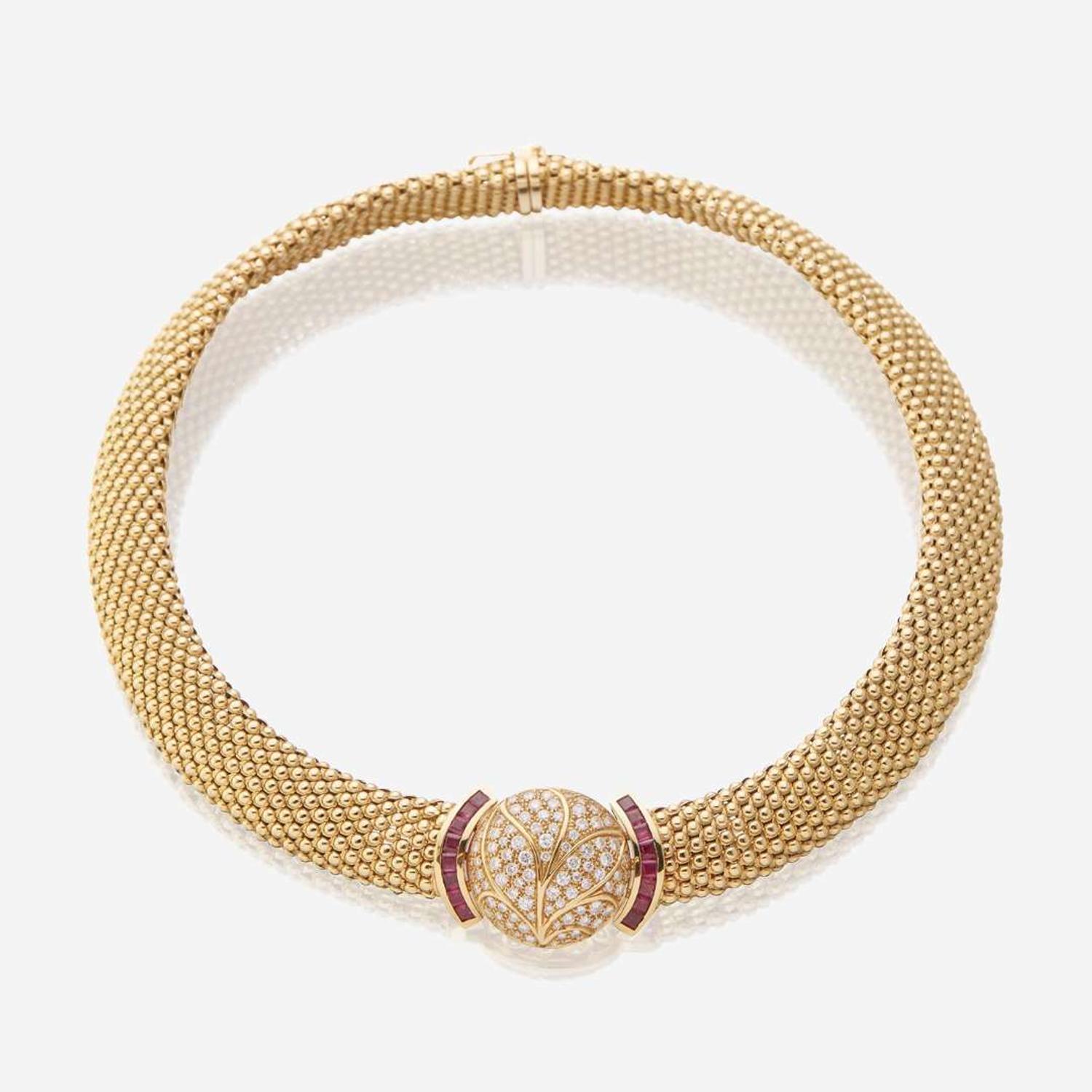 An eighteen karat gold, diamond, and ruby necklace