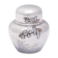 An Aesthetic Movement Japanesque Hammered Sterling Silver and Mixed Metal Tea Caddy