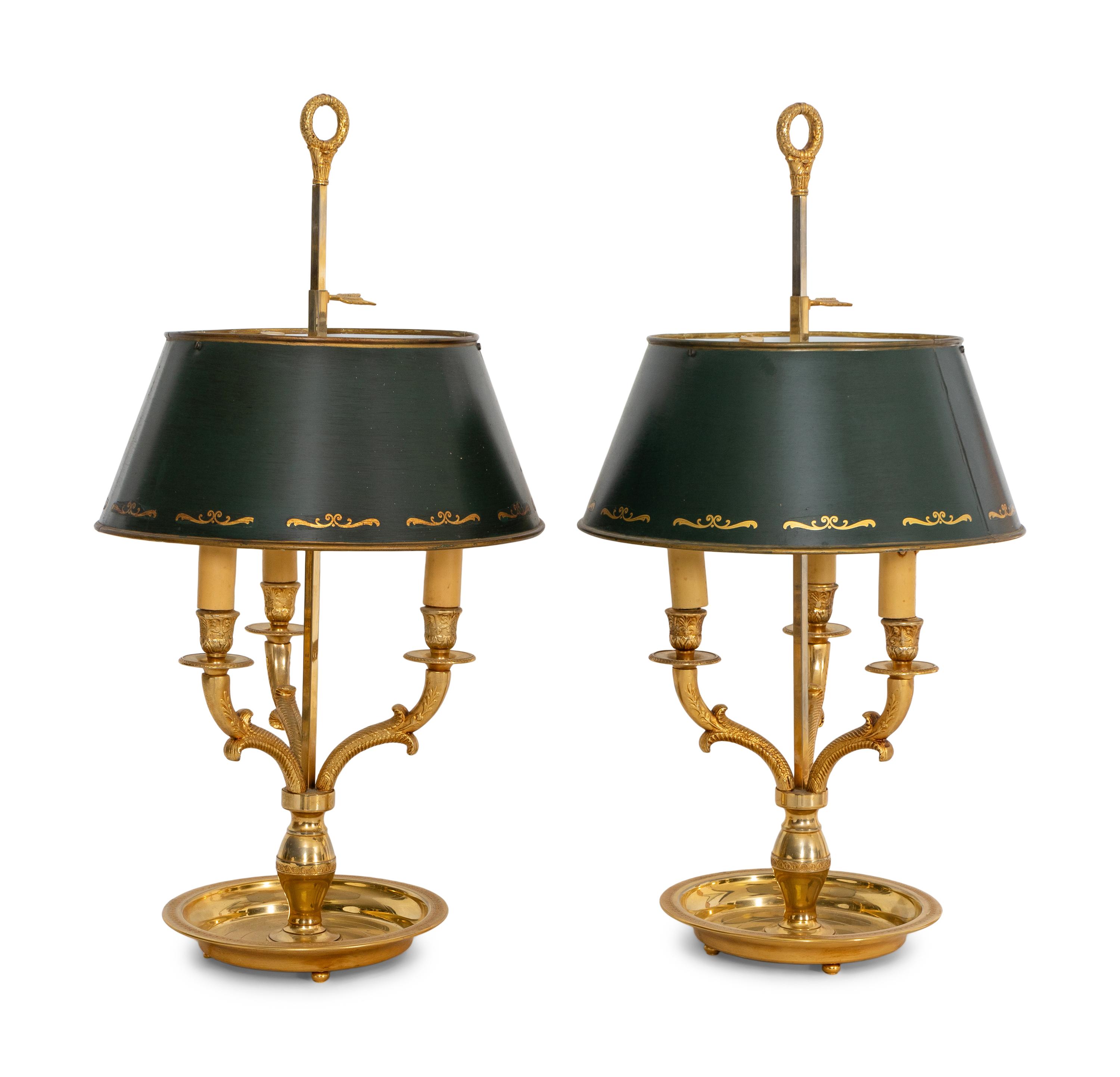 A Pair of Gilt Metal Bouillotte Lamps with Green Tole Shades