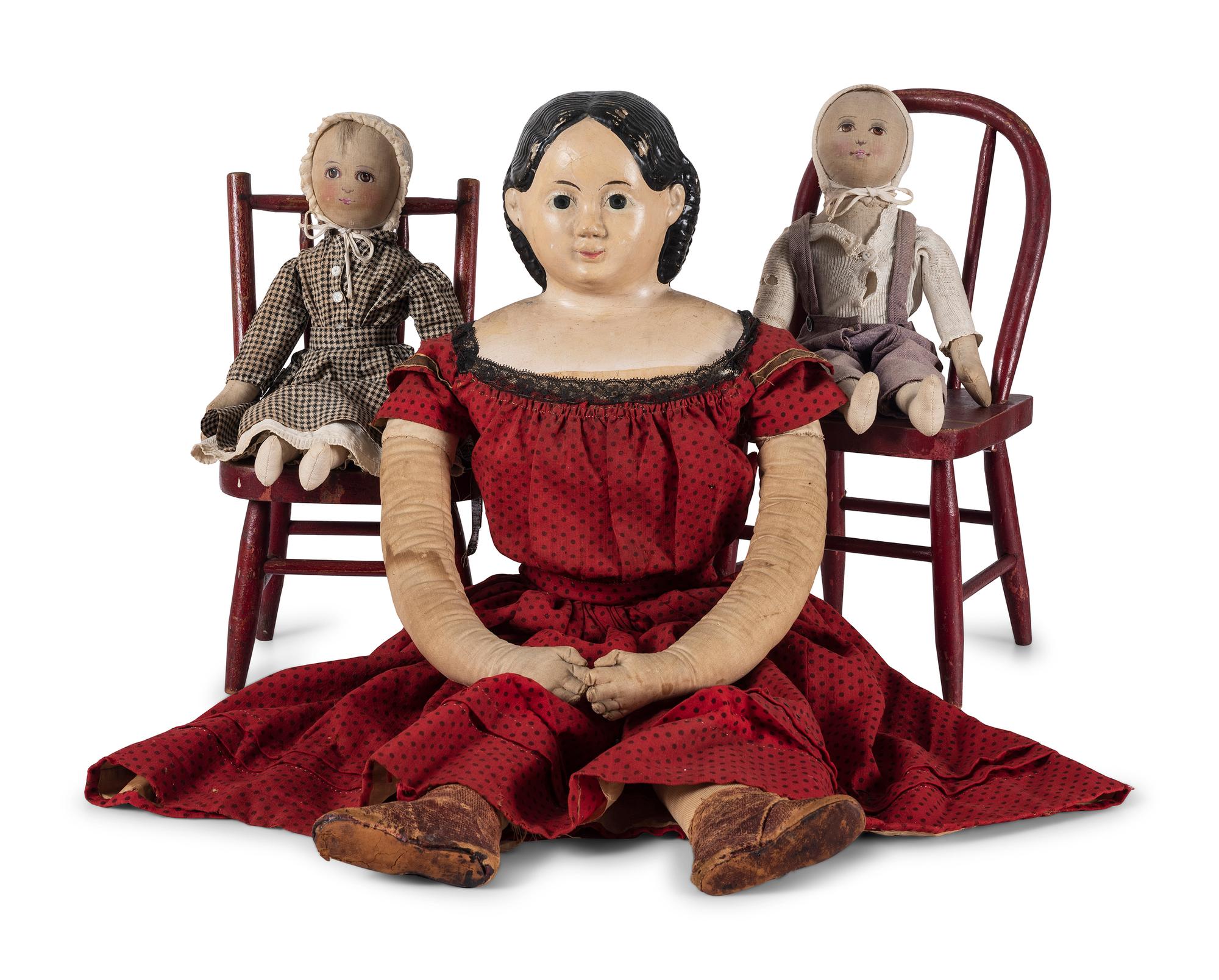 Two Red Painted Wood Child’s Chairs with Dolls