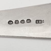A Collection of English Silver Basting and Serving Spoons