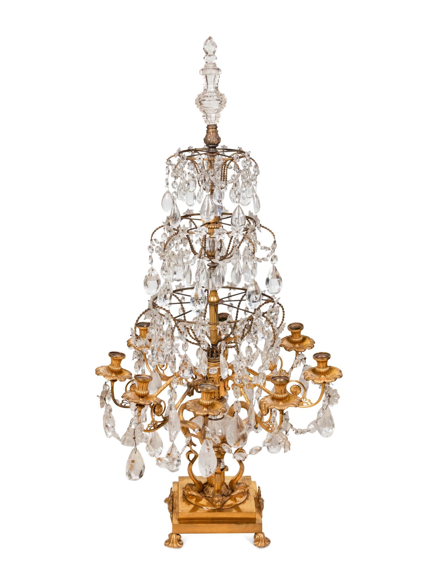 An Empire Style Four-Tier Gilt Bronze and Rock Crystal Eight-Light Girandole