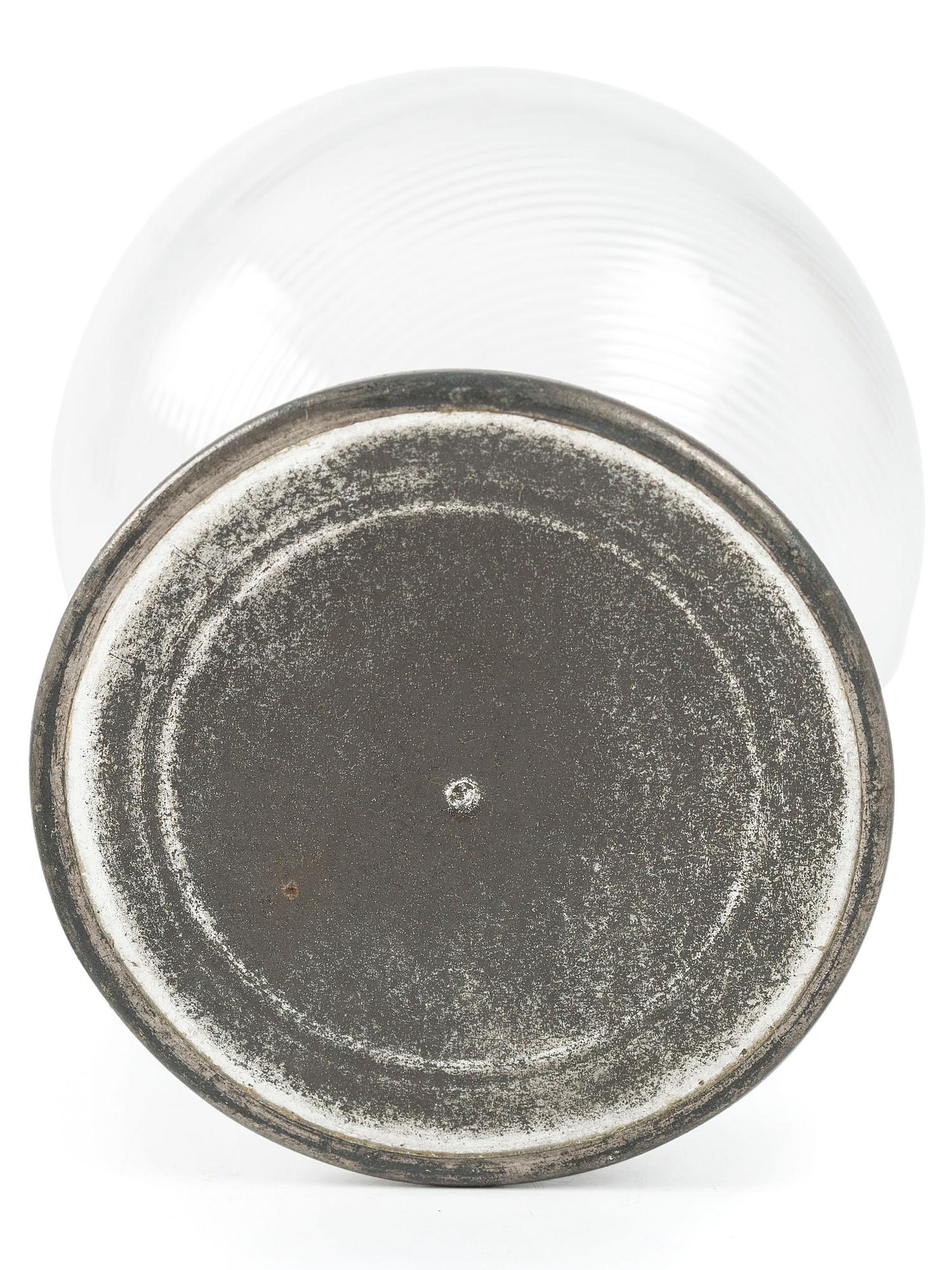 A Ribbed Glass Jug with Pewter Mount