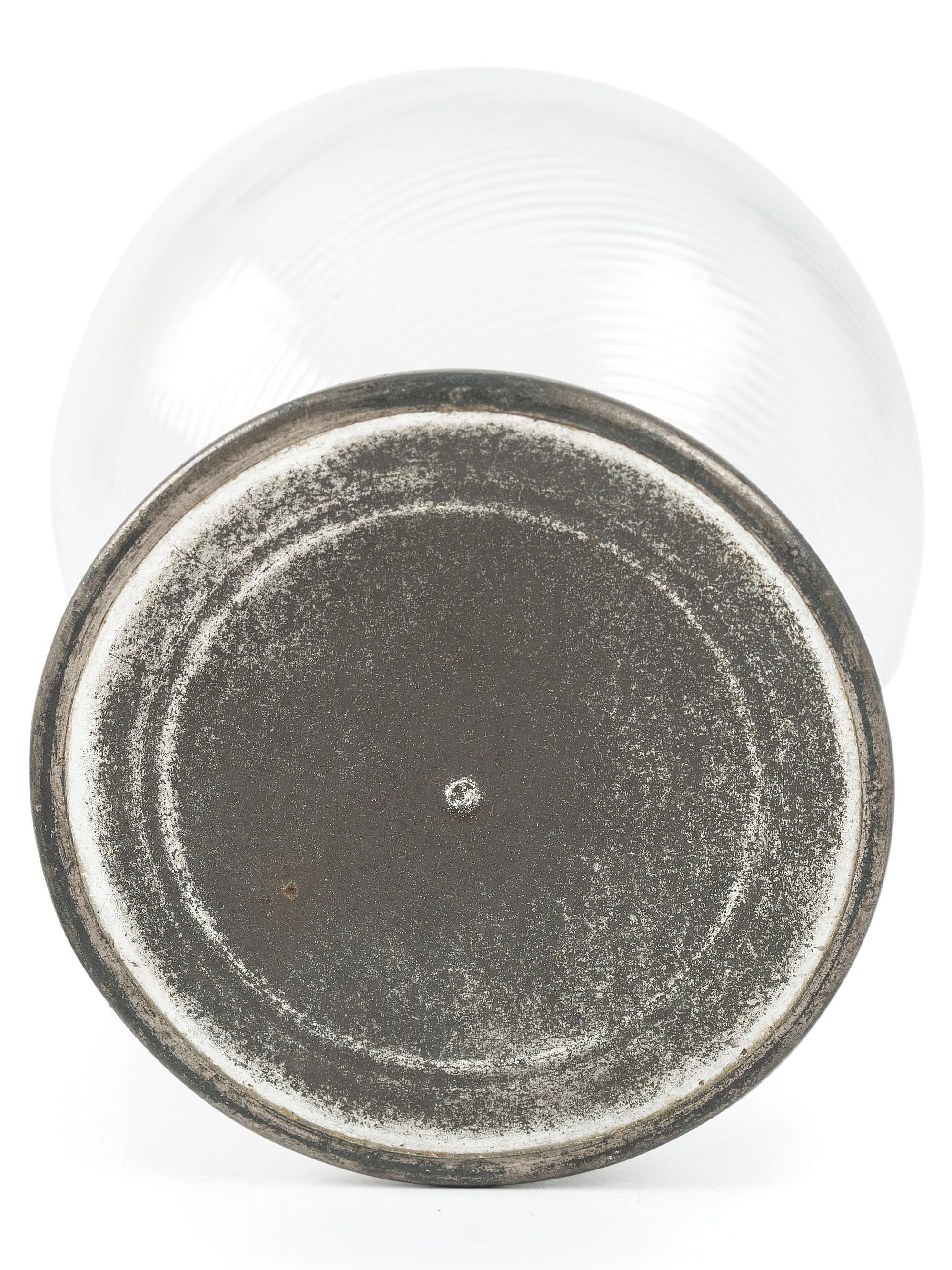 A Ribbed Glass Jug with Pewter Mount