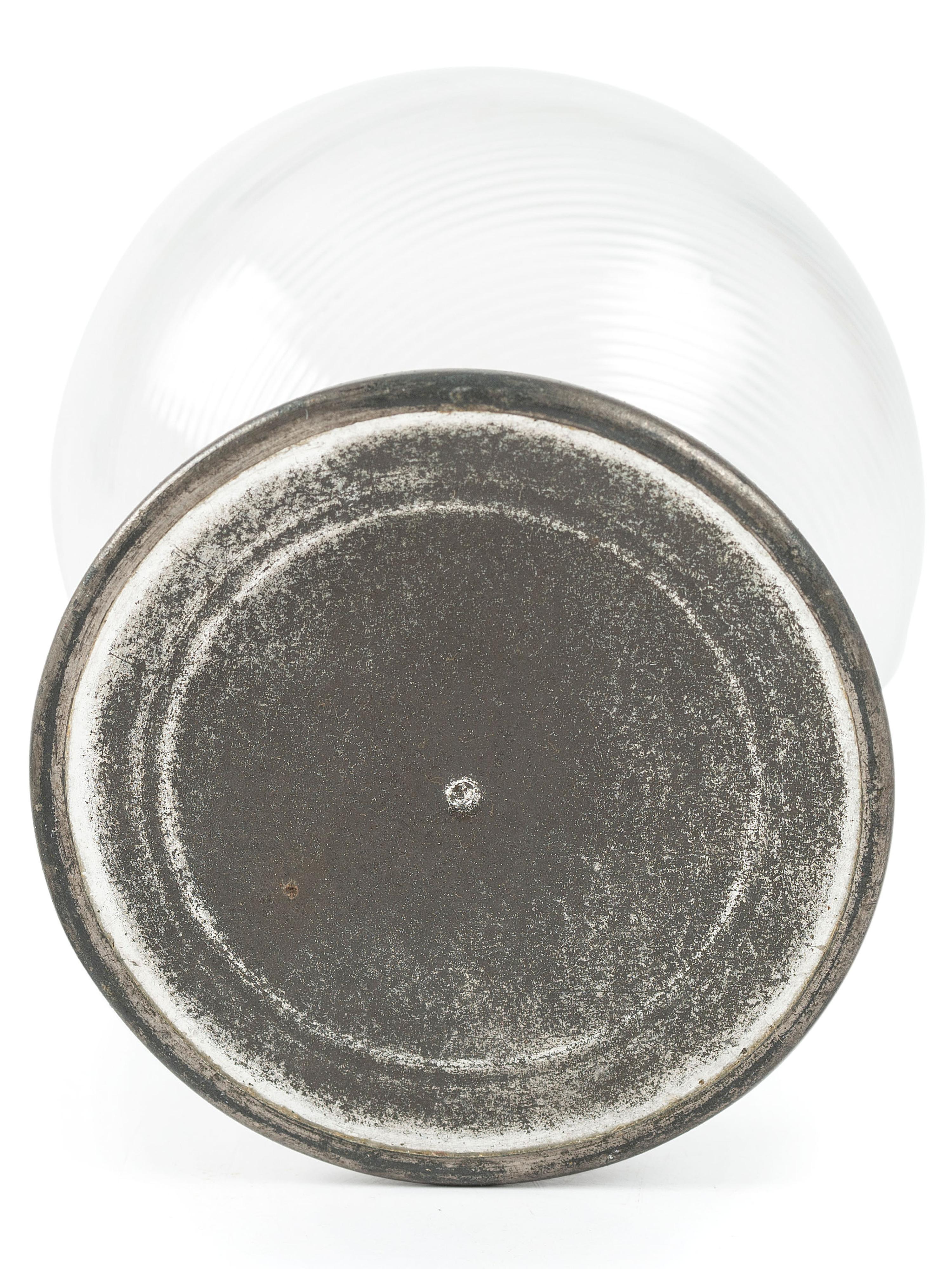 A Ribbed Glass Jug with Pewter Mount