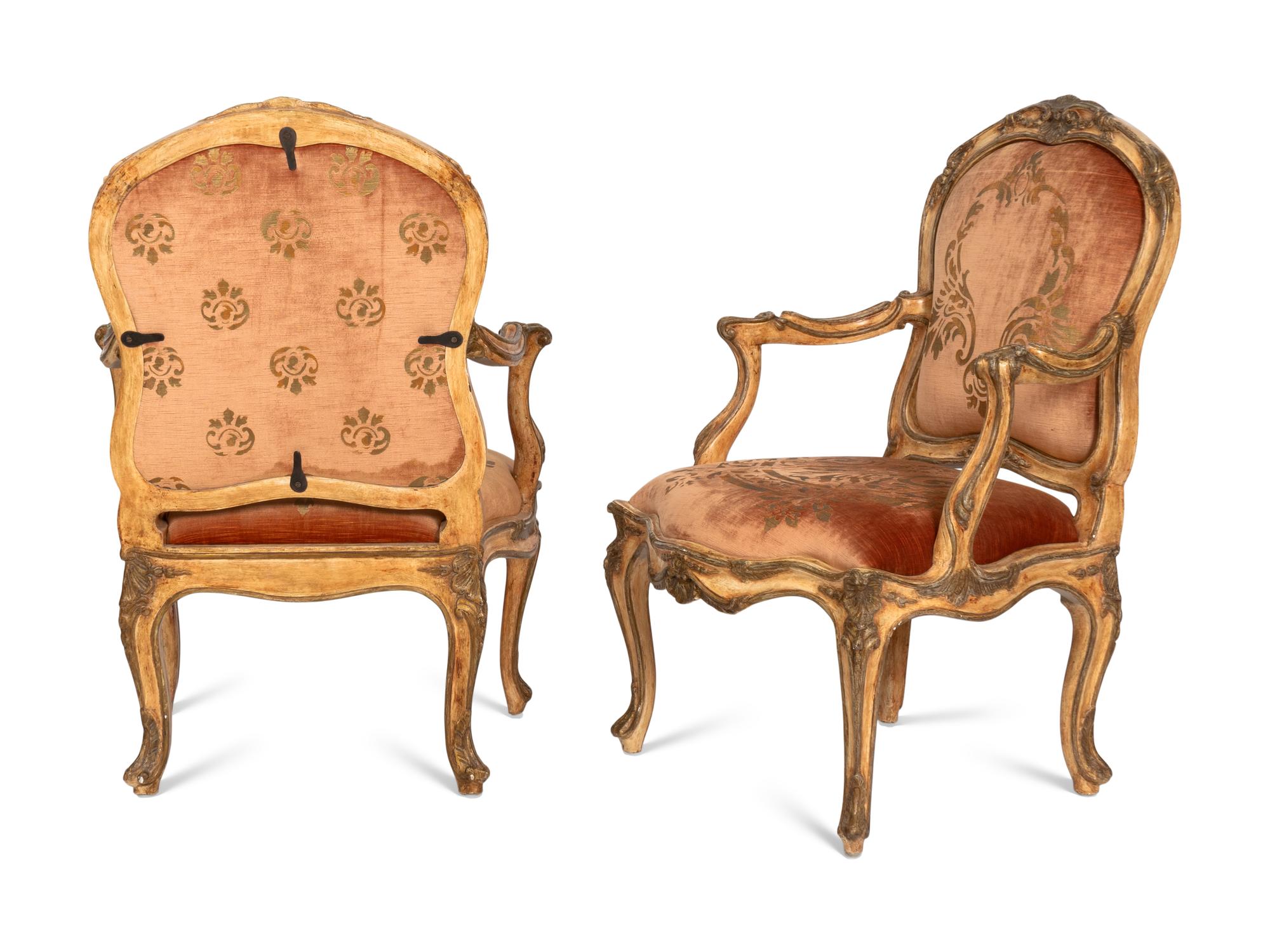 A Set of Twelve Louis XV Style Cream-Painted Fauteuils