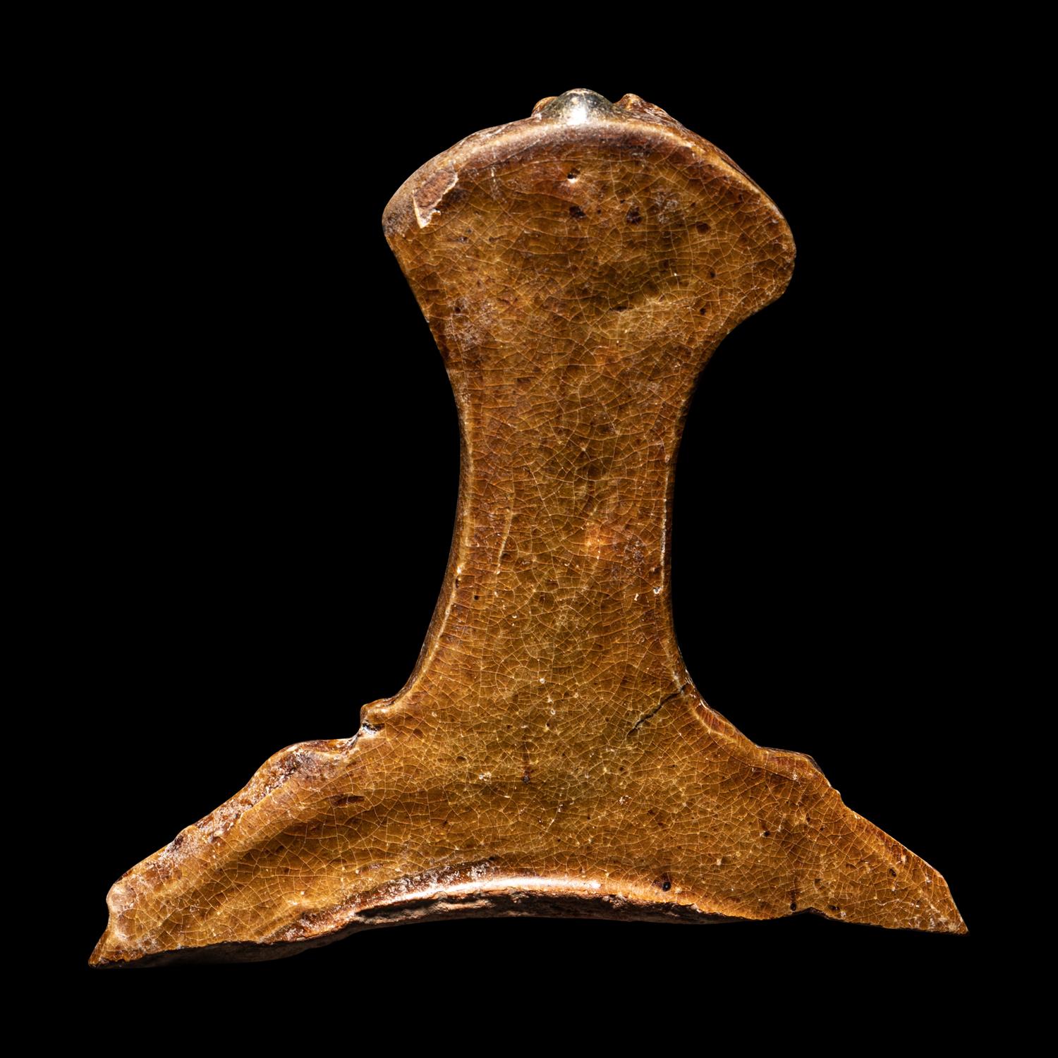 A Hellenistic Molded Glazed Pottery Handle