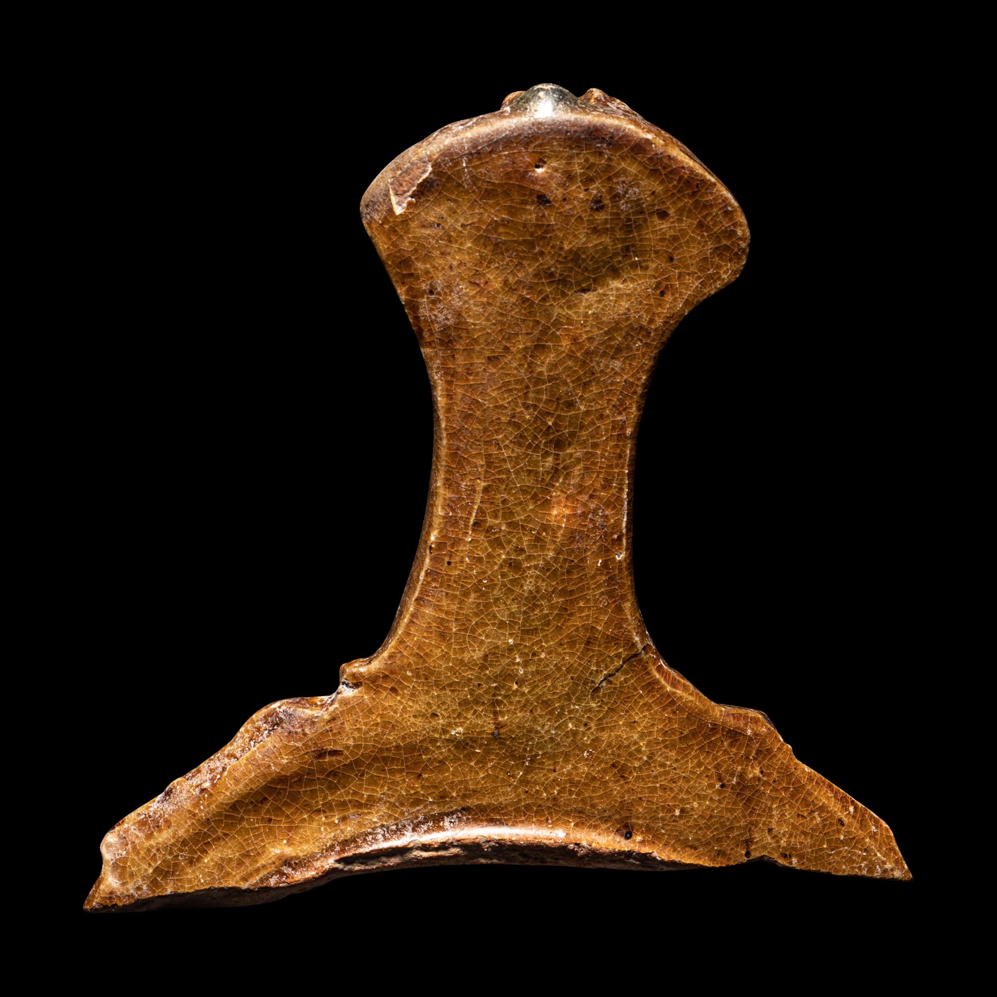 A Hellenistic Molded Glazed Pottery Handle