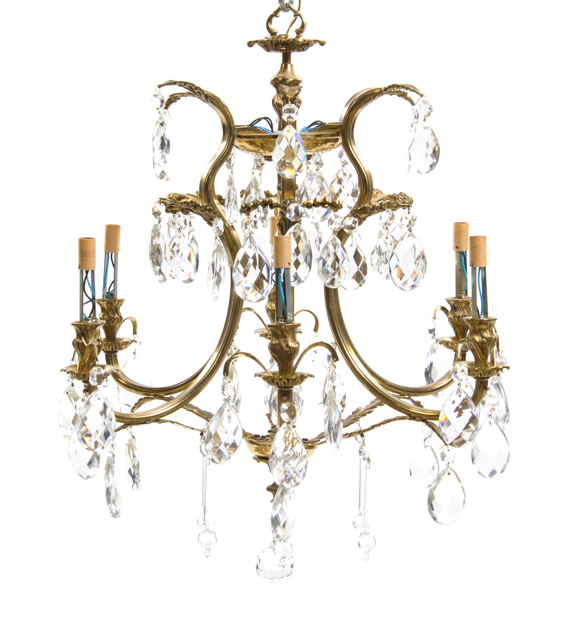 An American Brass Six-Light Chandelier, New Metal Craft, Height 24 inches.