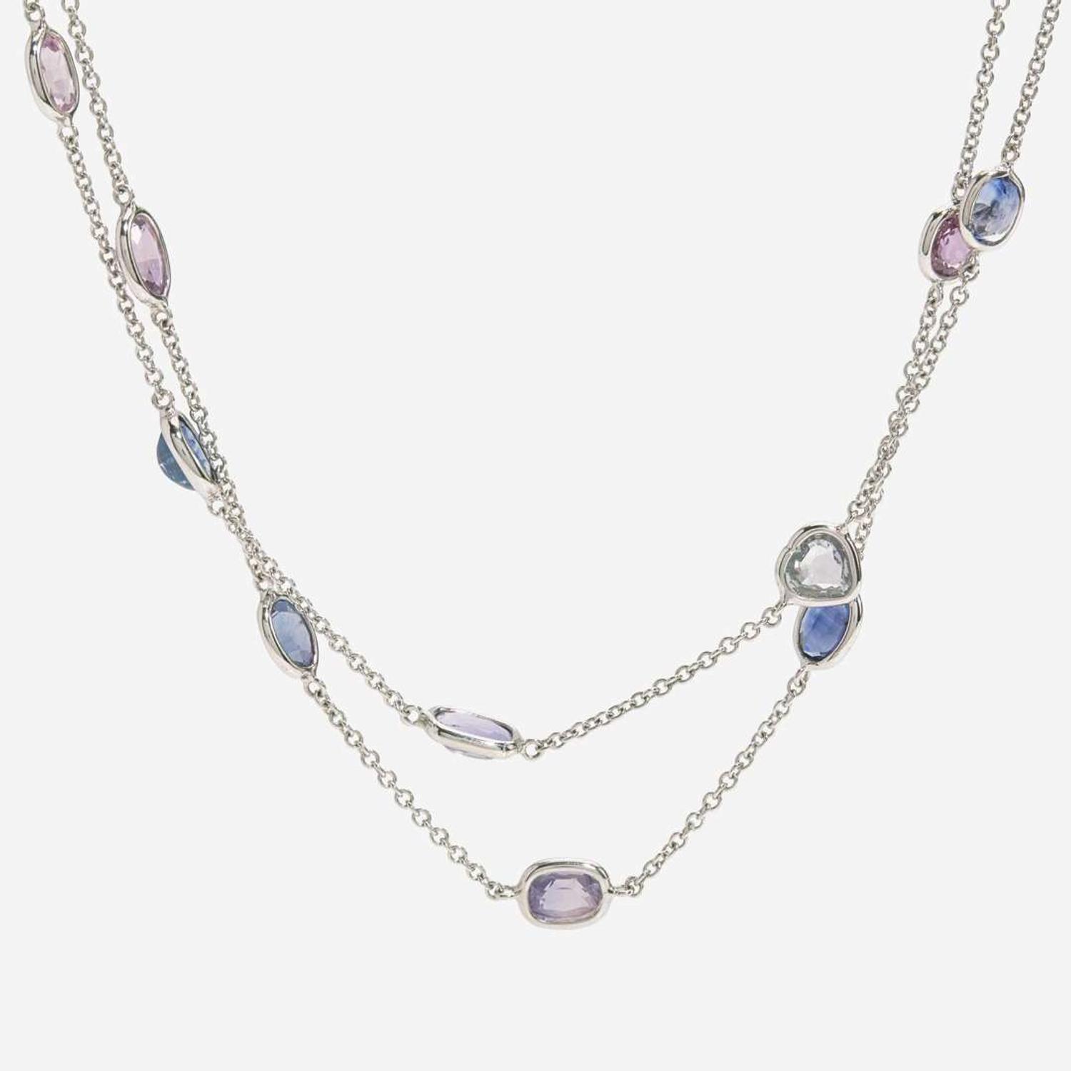 An 18 Karat White Gold Sapphire Station Necklace