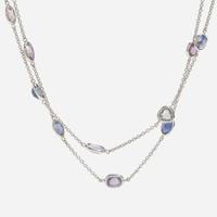 An 18 Karat White Gold Sapphire Station Necklace