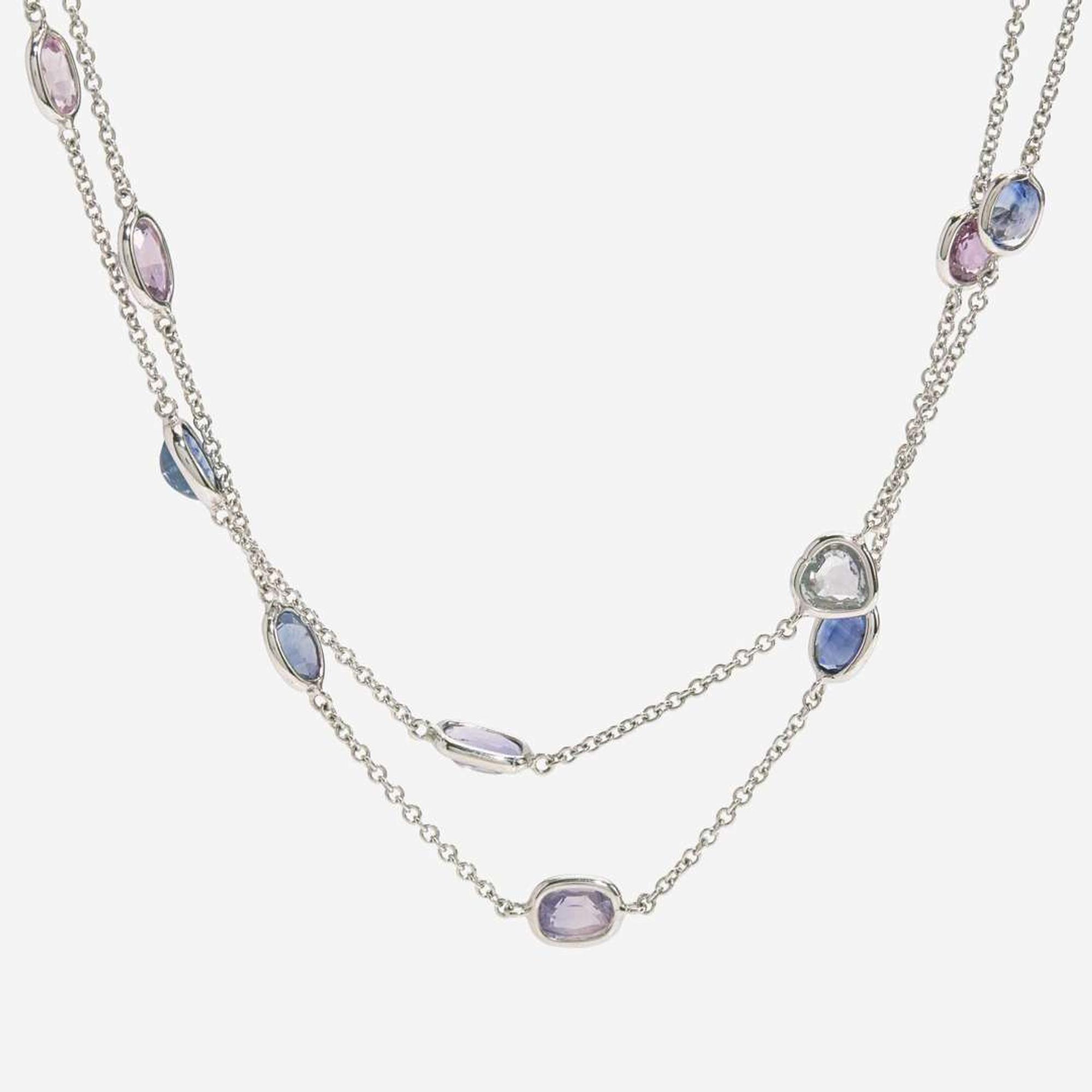 An 18 Karat White Gold Sapphire Station Necklace
