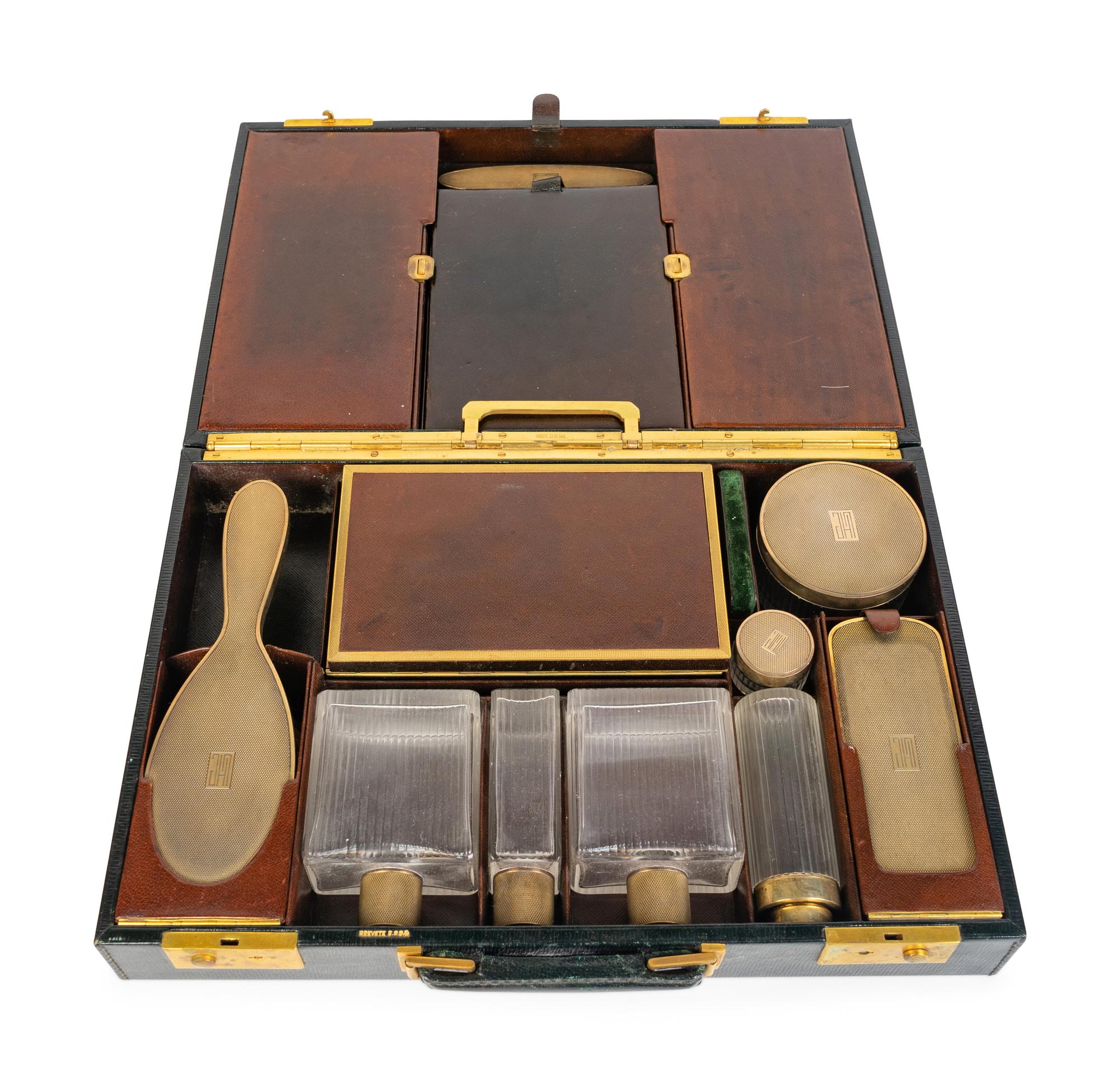 An Asprey Leather-Mounted Travel Case and a Cross Travel Case — SECOND QUARTER 20TH CENTURY