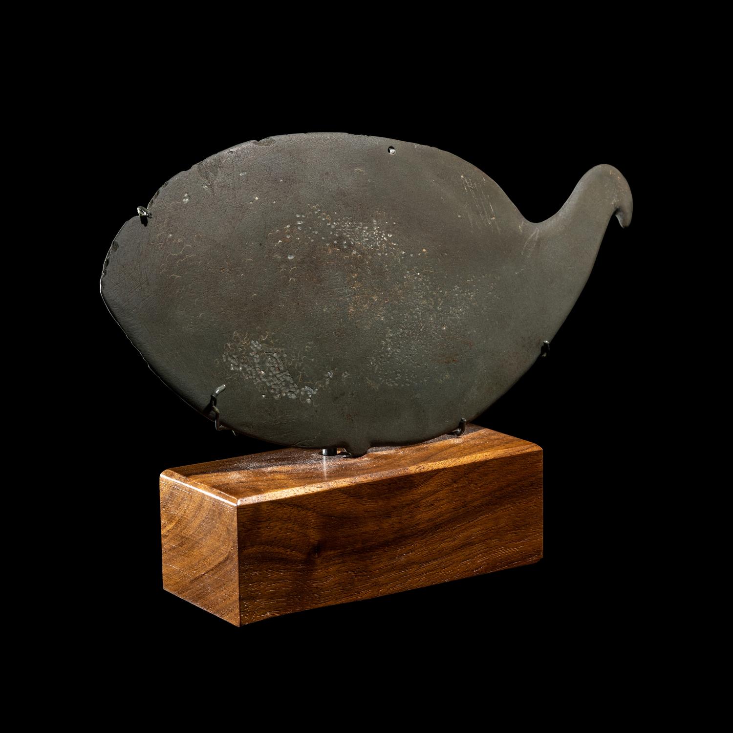 An Egyptian Greywacke Cosmetic Palette in the Form of a Bird