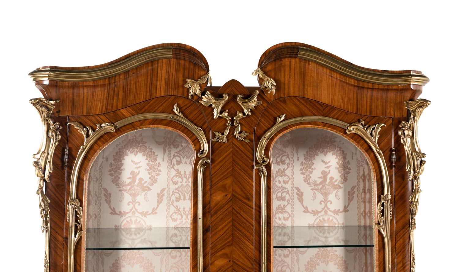 A Pair of Louis XV Style Gilt Bronze Mounted Tulipwood Vitrine Cabinets