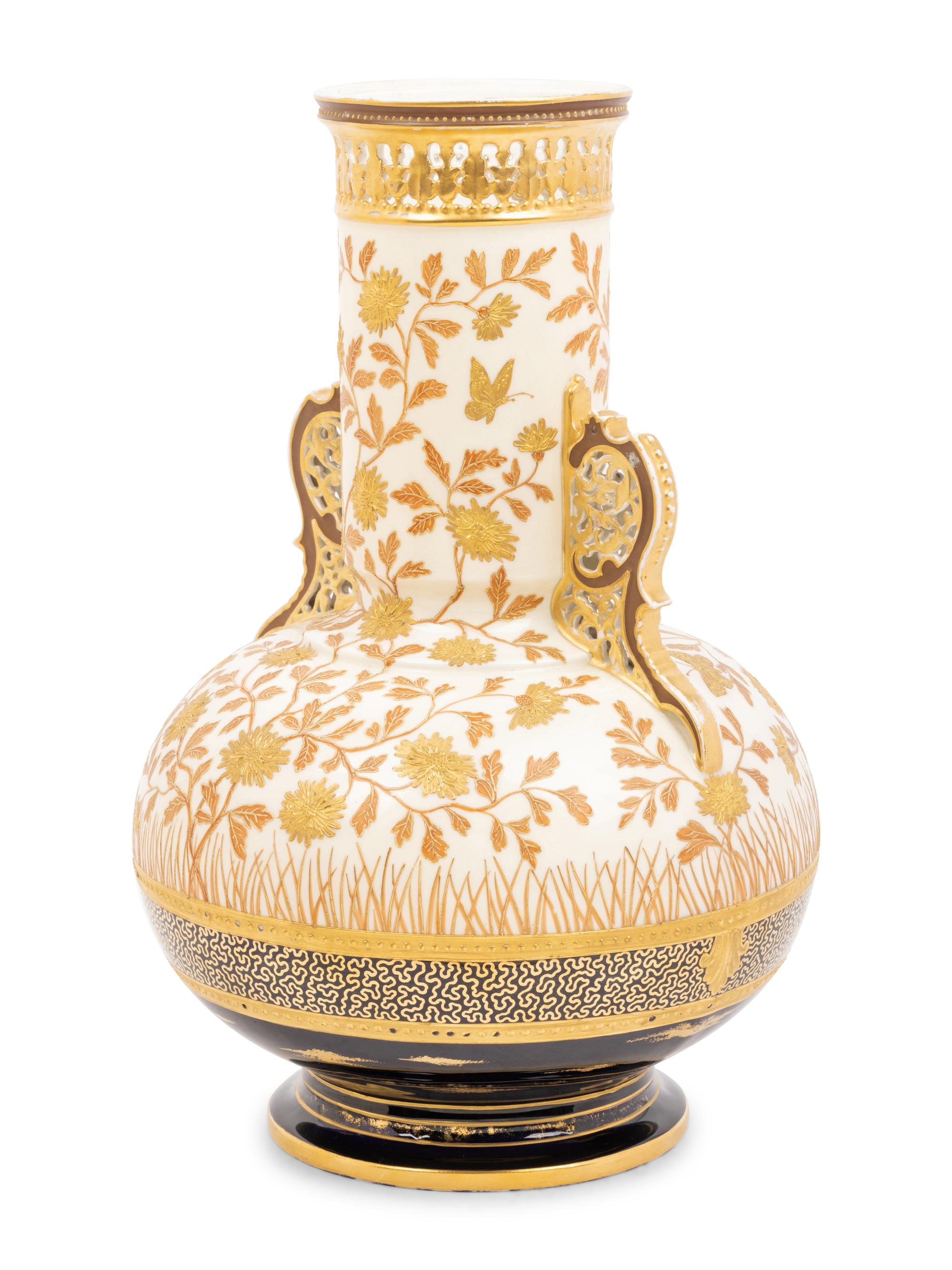 An Aesthetic Movement Gilt Decorated Earthenware Vase