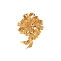 TIFFANY & CO., RUBY AND YELLOW GOLD RIBBON BROOCH
