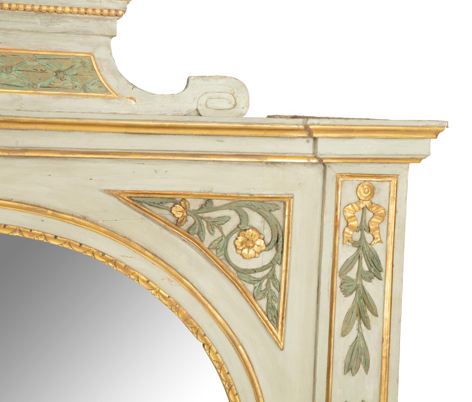 A North Italian Painted and Parcel Gilt Mirror