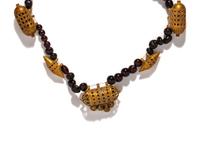 An Islamic Gold and Garnet Necklace