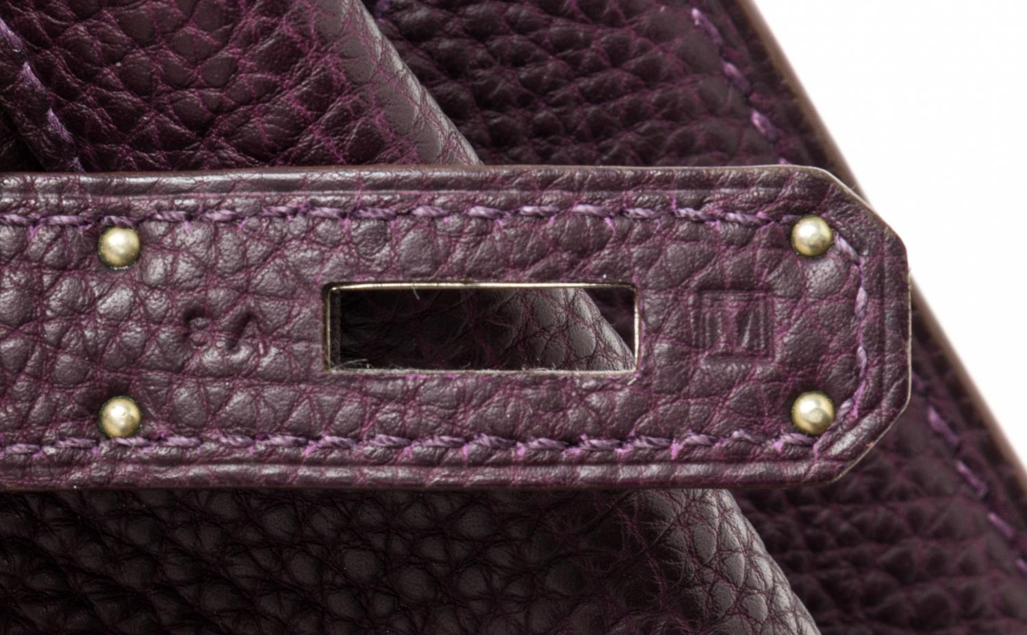 An Hermes Raisin Togo 22cm So-Kelly Handbag, 9" x 11" x 4.5".