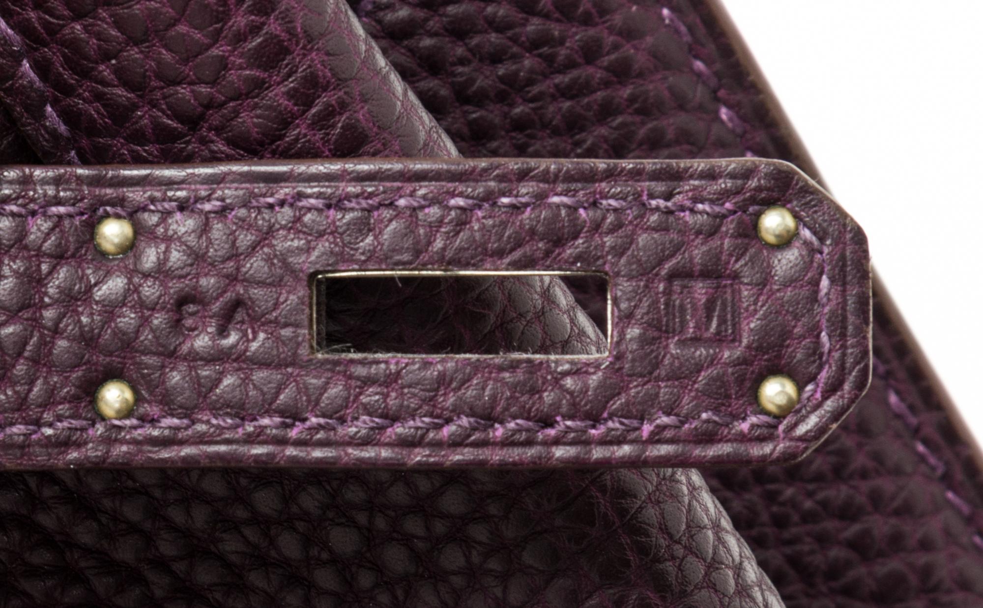 An Hermes Raisin Togo 22cm So-Kelly Handbag, 9" x 11" x 4.5".
