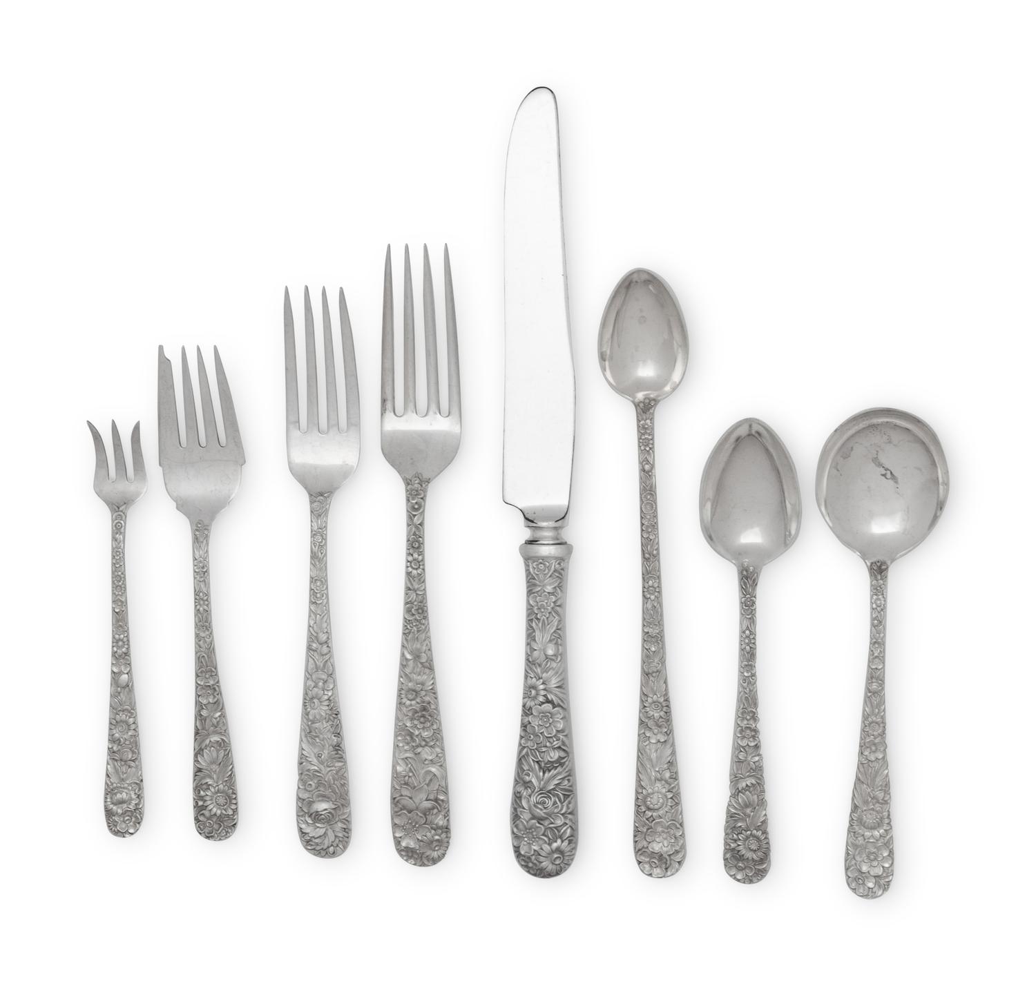 A Large S. Kirk and Son Repousse Silver Flatware Service