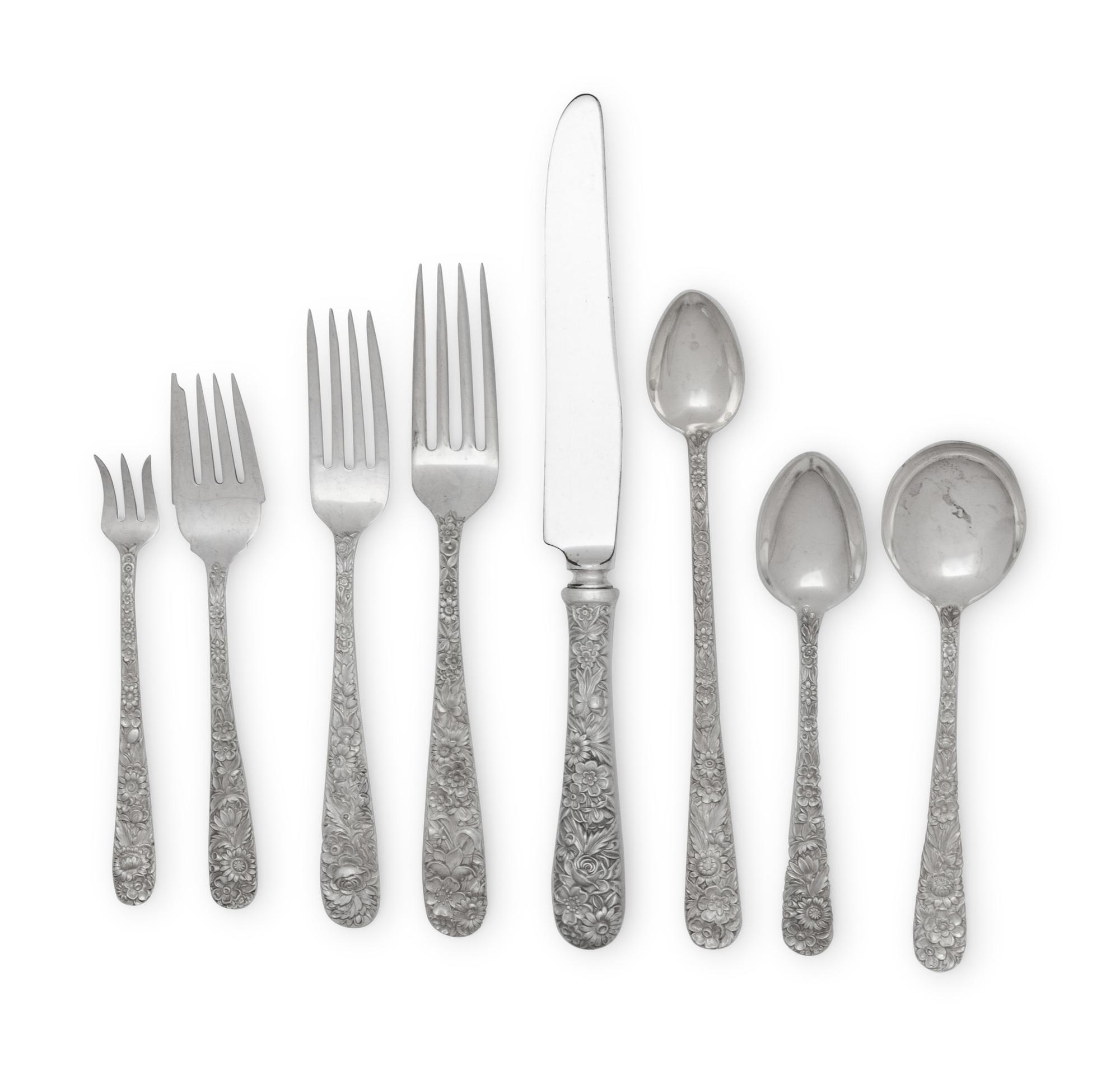 A Large S. Kirk and Son Repousse Silver Flatware Service