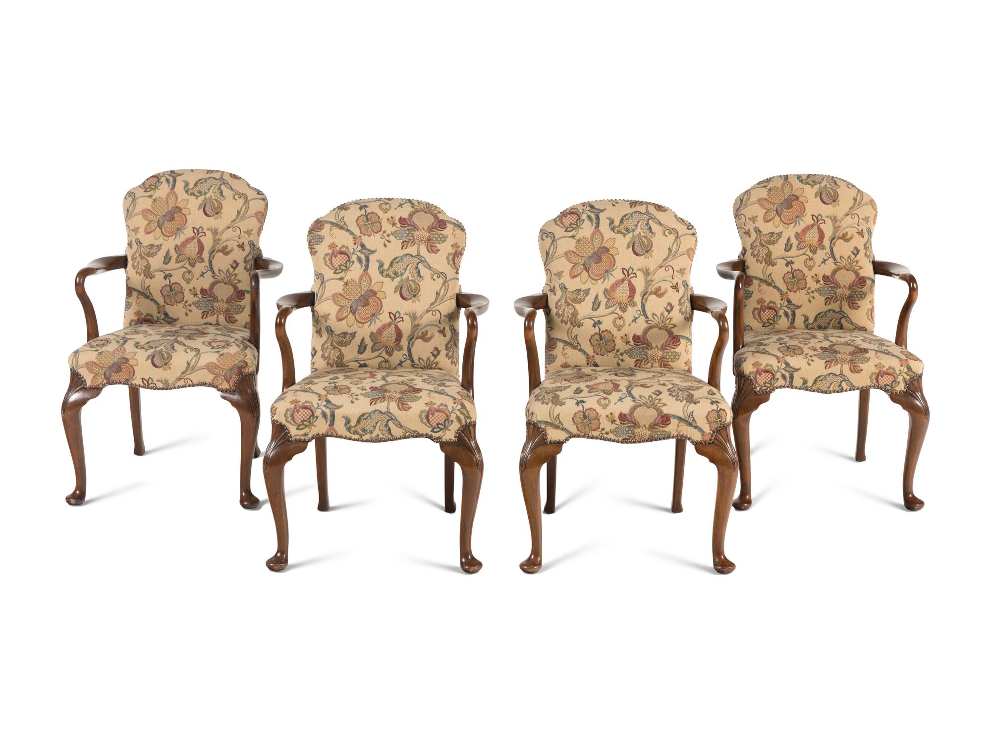 A Set of Four Queen Anne Style Walnut Armchairs